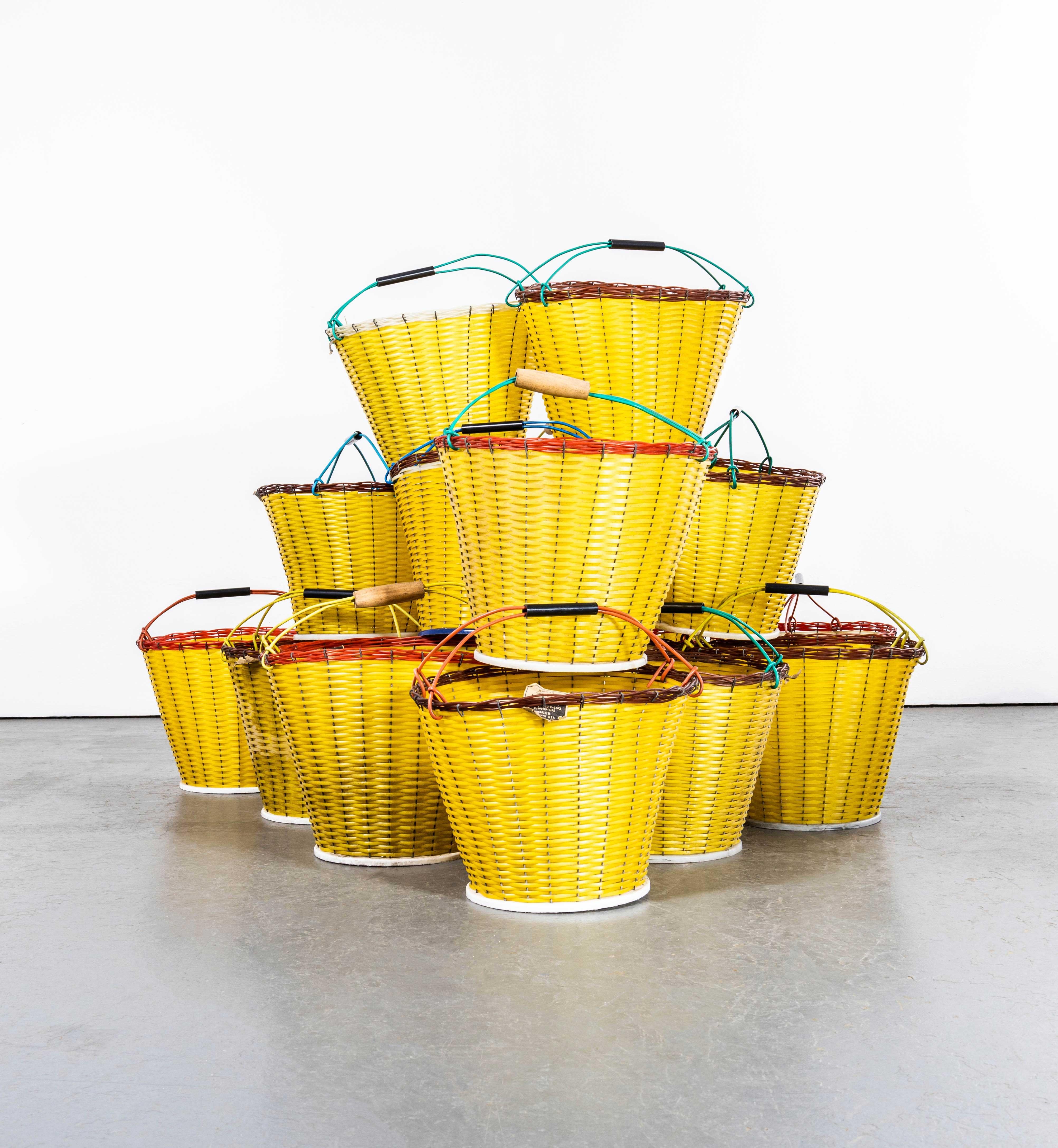 1950's Yellow Grape Picking Baskets - New Old Stock GDR - Good Quantity Available. 

Stunning original new old stock grape picking baskets from the GDR, better known as post war Eastern Europe. Most have original GDR labels. Hand woven in the 1950's