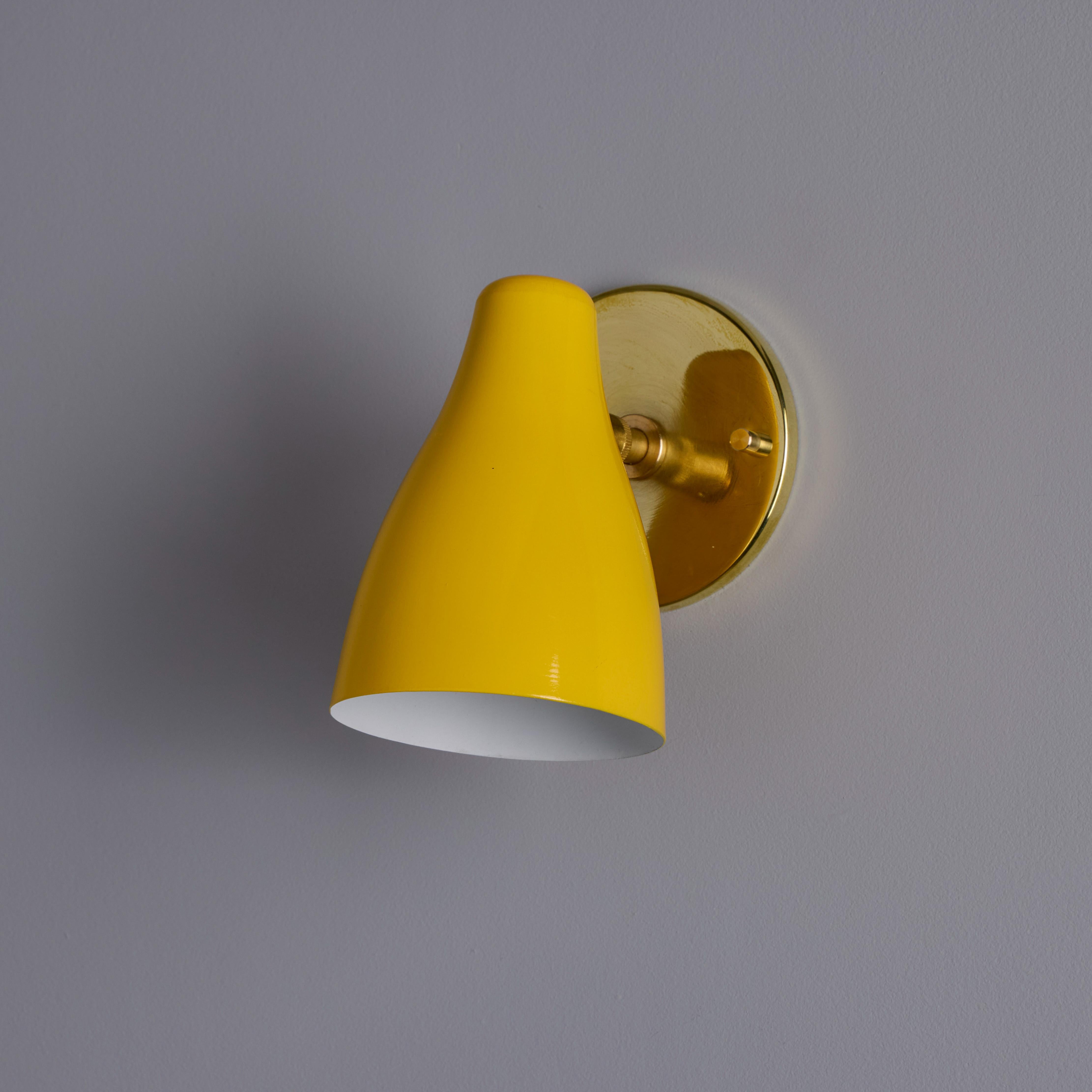 1950s Yellow Painted Metal & Brass Wall Lamp Attributed to Stilnovo In Good Condition For Sale In Glendale, CA