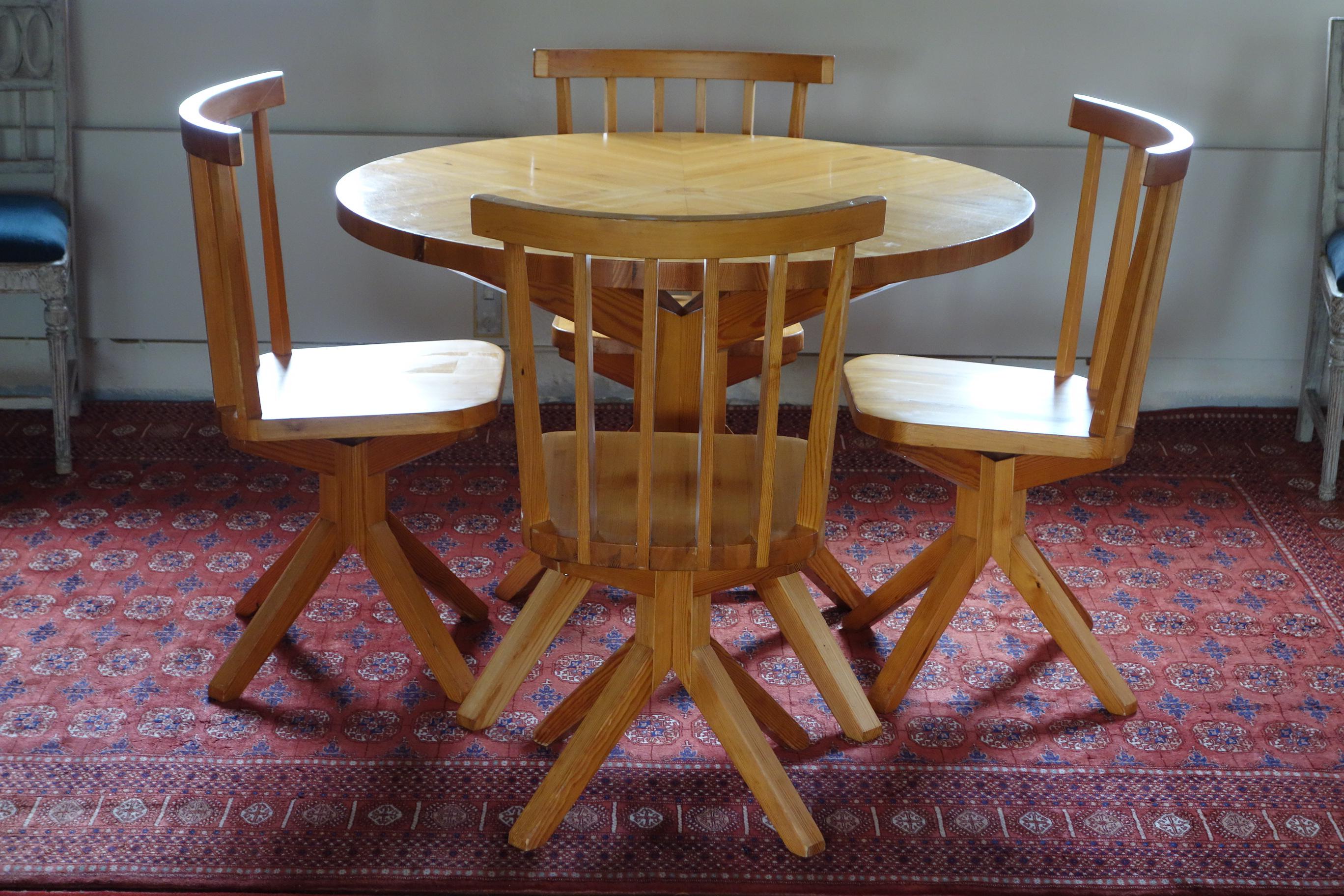 Presumably unique spider dining set made by a master carpenter. Made of solid pine with a star-shaped table top.