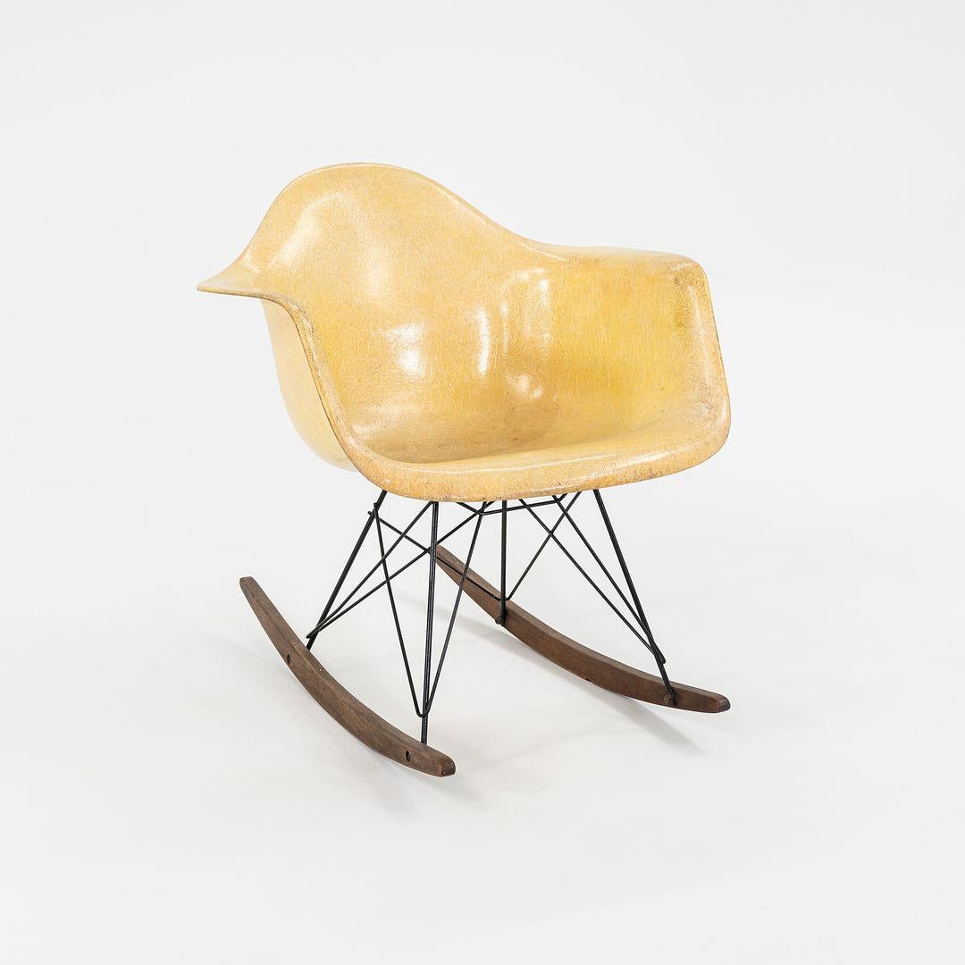 This is a very rare, early 'RAR' Rocking Chair, initially designed by Ray and Charles Eames in 1950. This particular chair dates to around 1951, as determined by the early Zenith label that is intact. The design features a fiberglass shell seat in