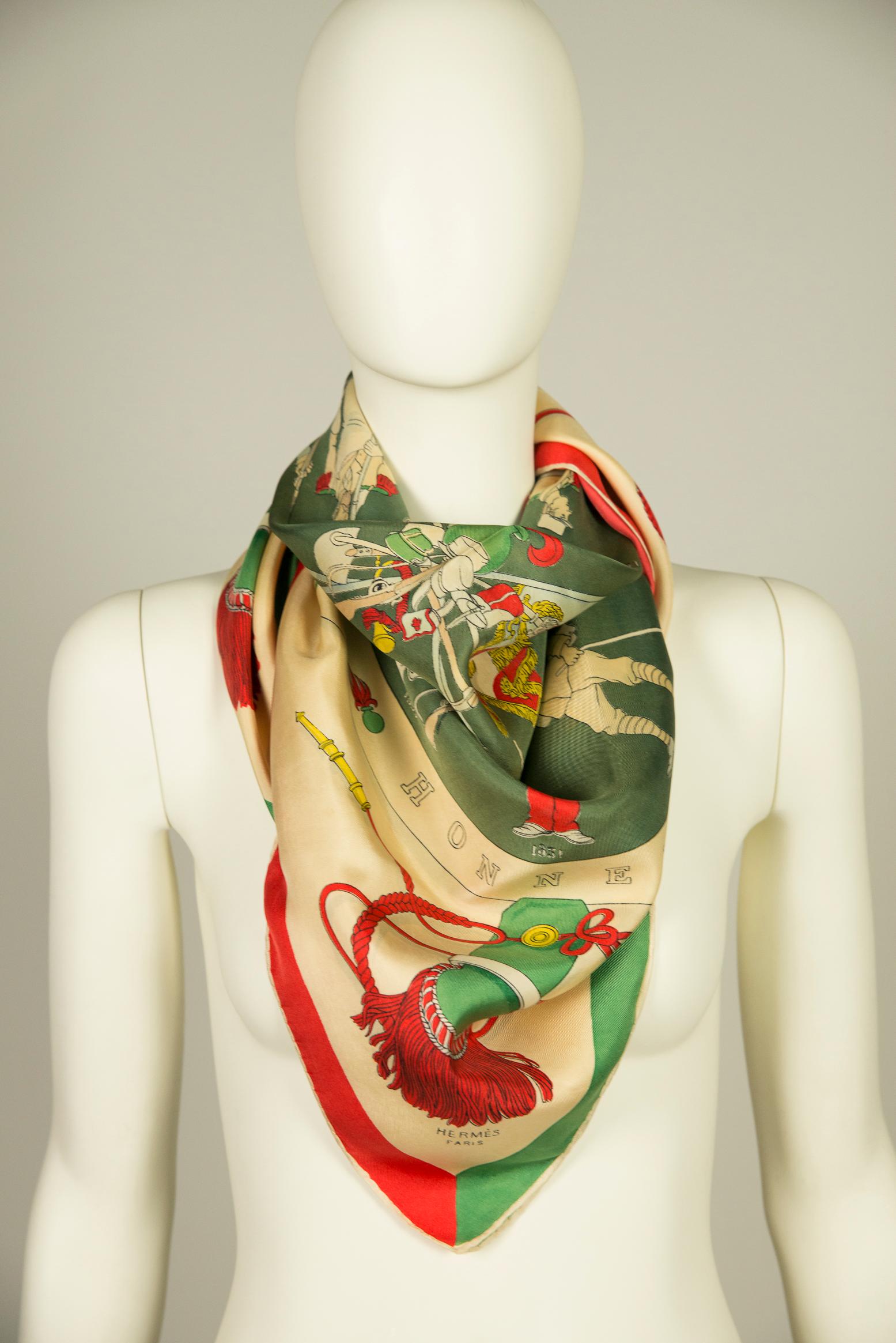 Very rare Hermès “A la Gloire de la Légion Etrangère” silk twill Carré scarf. Signed by Hugo Grygkar and issued in 1951, this scarf pays hommage to a specific corps of the French Army : the French Foreign Legion. The print depicts 16 legionnaires in