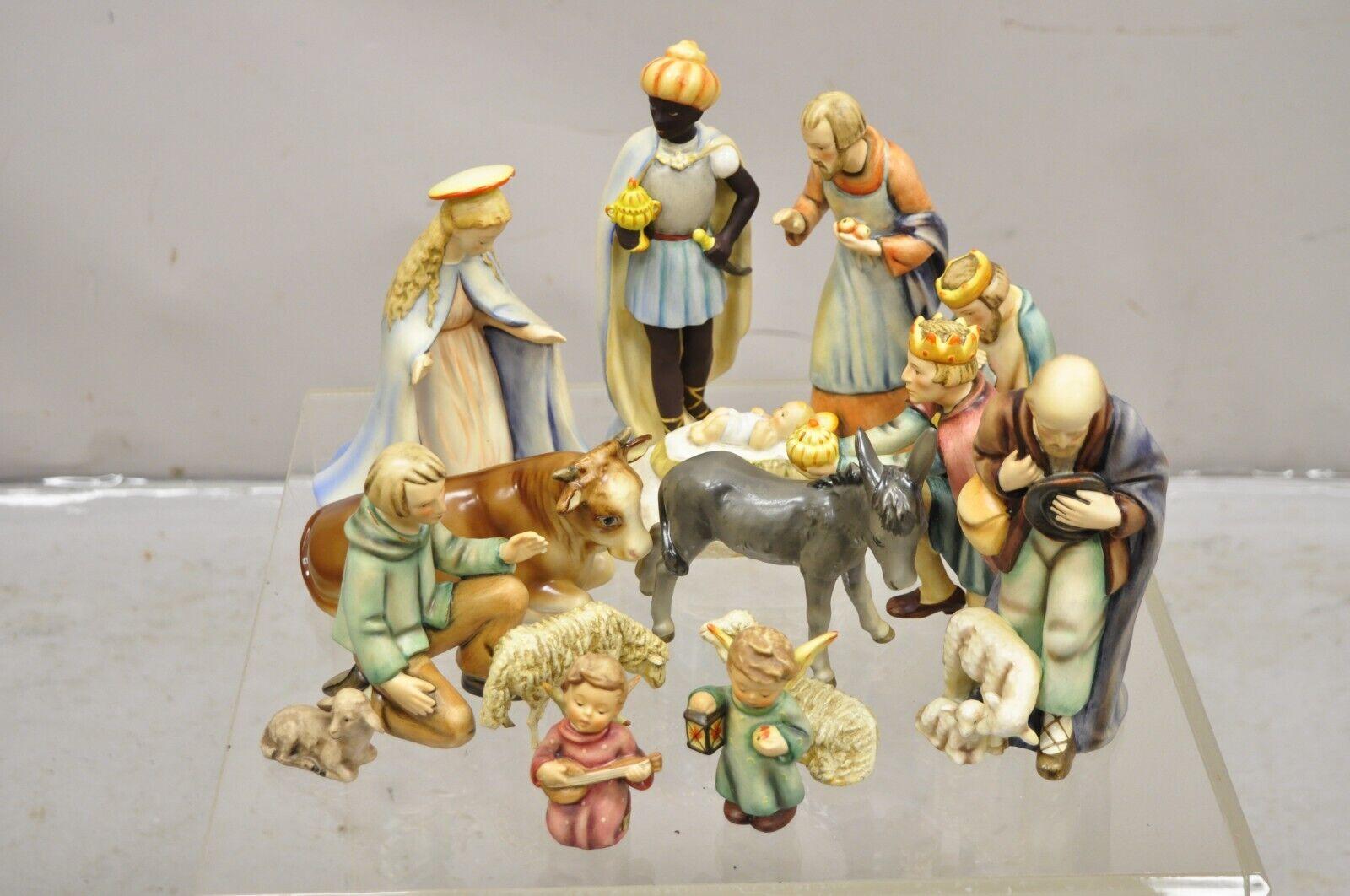 1951 Vintage Hummel Goebel Nativity Scene 15 Pc Figurine Christmas Set with Lighted Manger Set 214. Circa  1951.
Measurements: 
Various measurements ranging from:
Smallest piece (Animal): 1.5