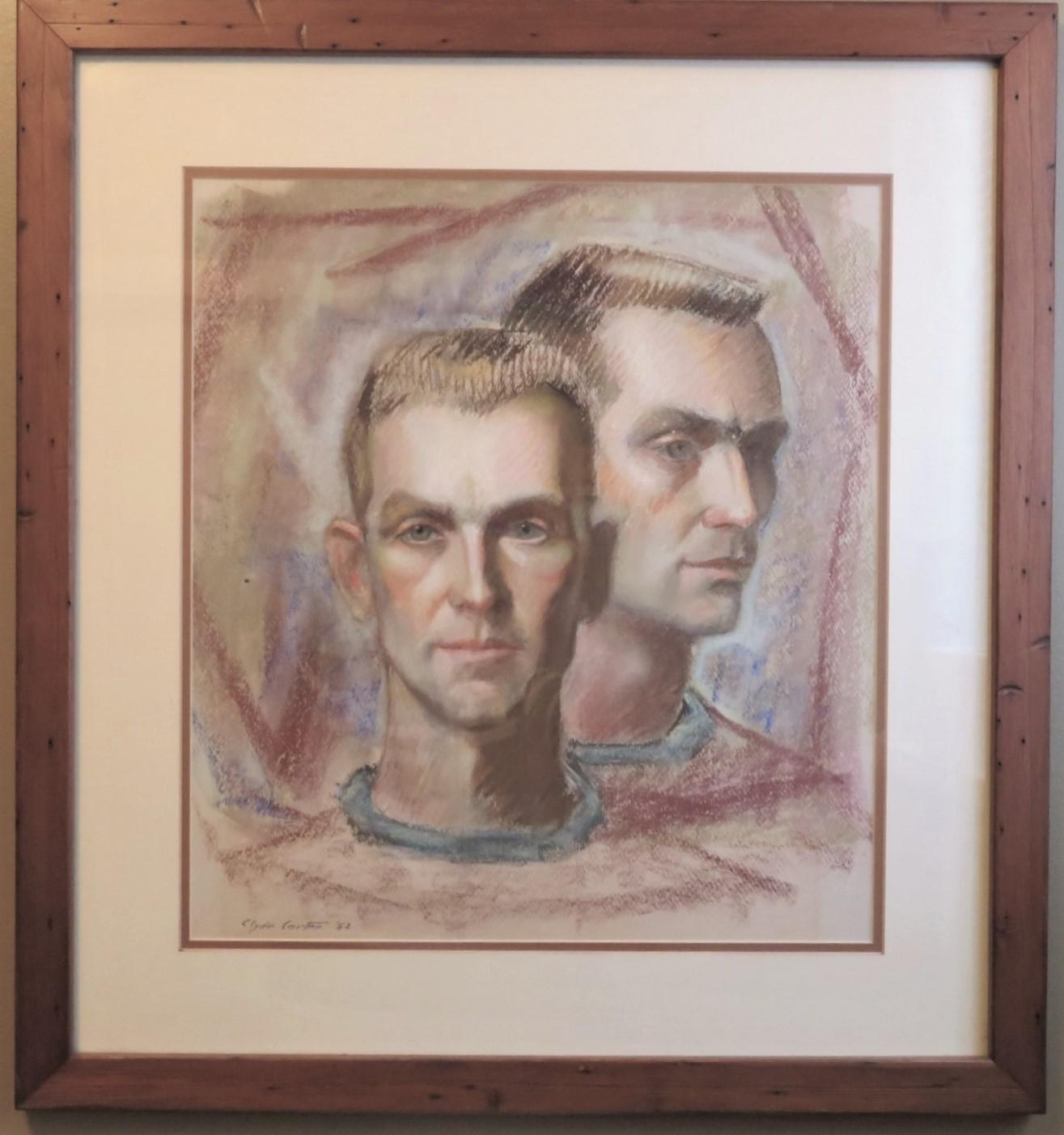 Signed Clyde Carter and dated '52, here you have a framed and double matted portrait of a young man featuring a side and front facial view.  Wonderful colors, done in crayon and pastels on paper.  Period flat top hair style and a crew neck shirt, a