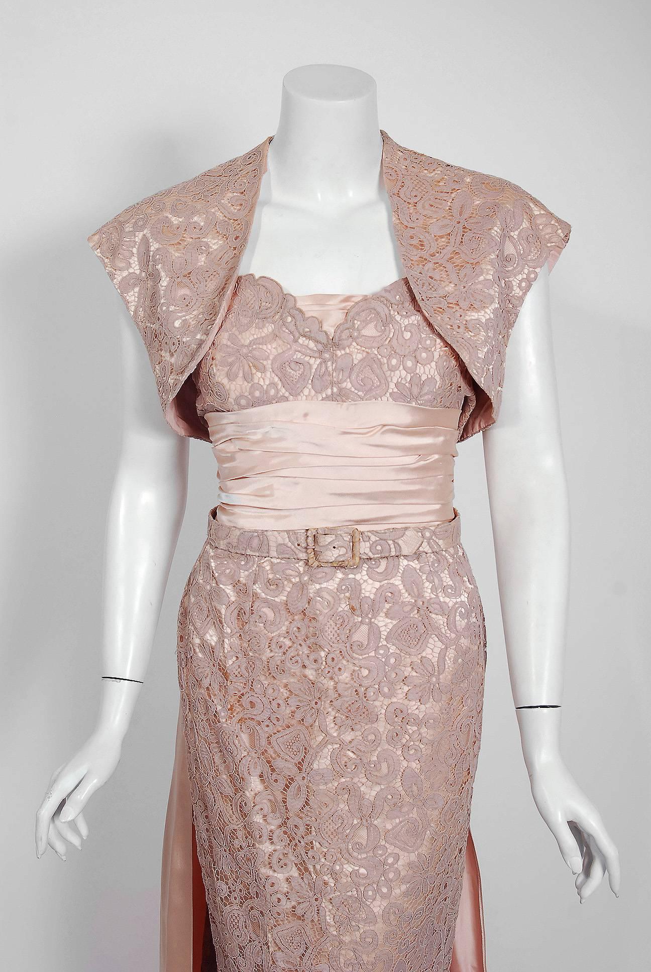 Breathtaking Pierre Balmain pale champagne pink silk and lace demi-couture gown ensemble dating back to his 1952 collection. Balmain created a very sculptural quality which was always allied with a ladylike essence. His garments have a body and a