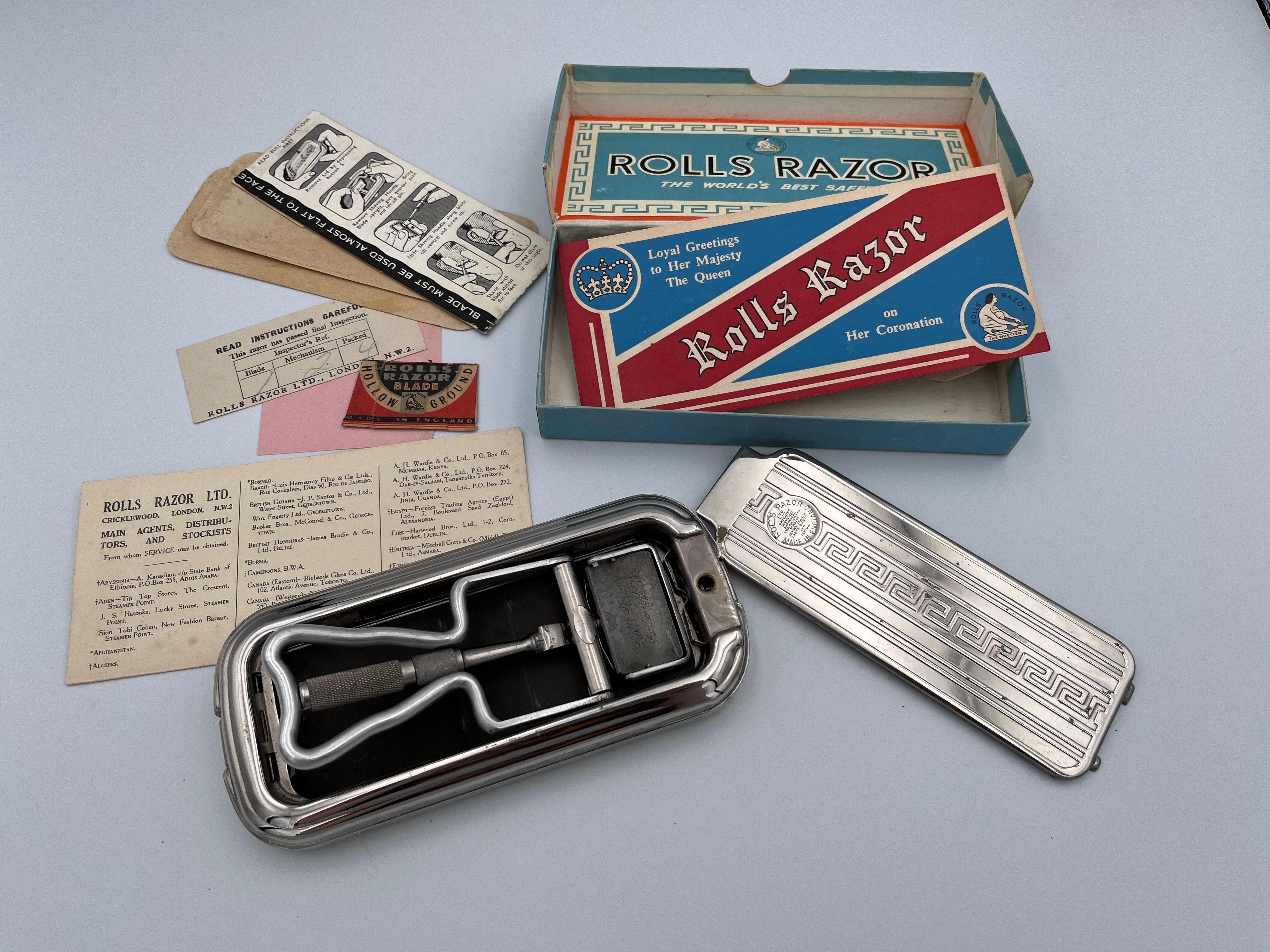 1953 England Rolls Razor Viscount Model in Original Box with Paperwork

This 1953 Rolls Razor Viscount Model from England is a superb example of mid-century shaving innovation and design. Housed in its original blue, white, and orange cardboard box