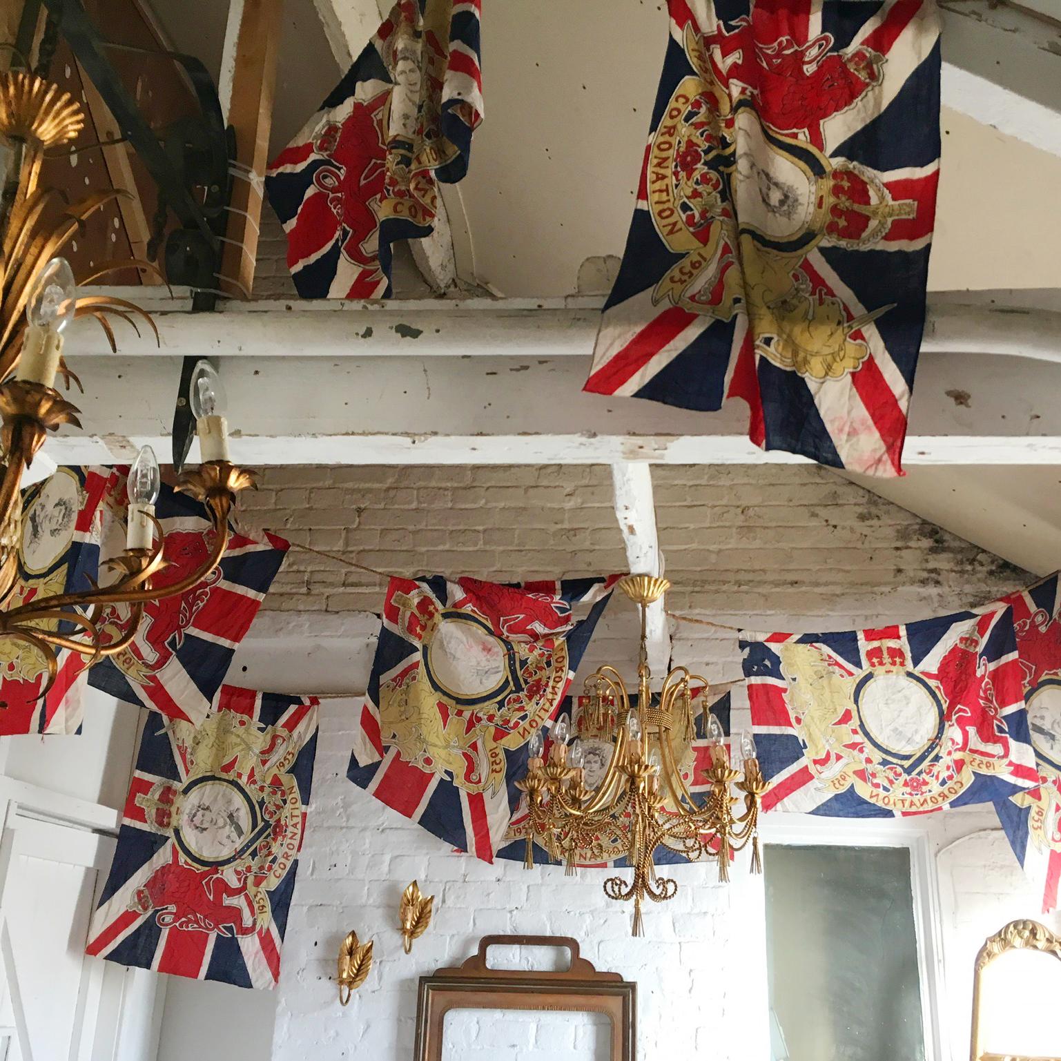 A Rare And Historical Royal Coronation Flag Bunting from The Coronation Of HRH Queen Elizabeth 2nd, June 2nd 1953

Due To The Size This Bunting Would Have Been Used Strung Across A Road Or Over A Building For One Of The Many Street Parties Held To