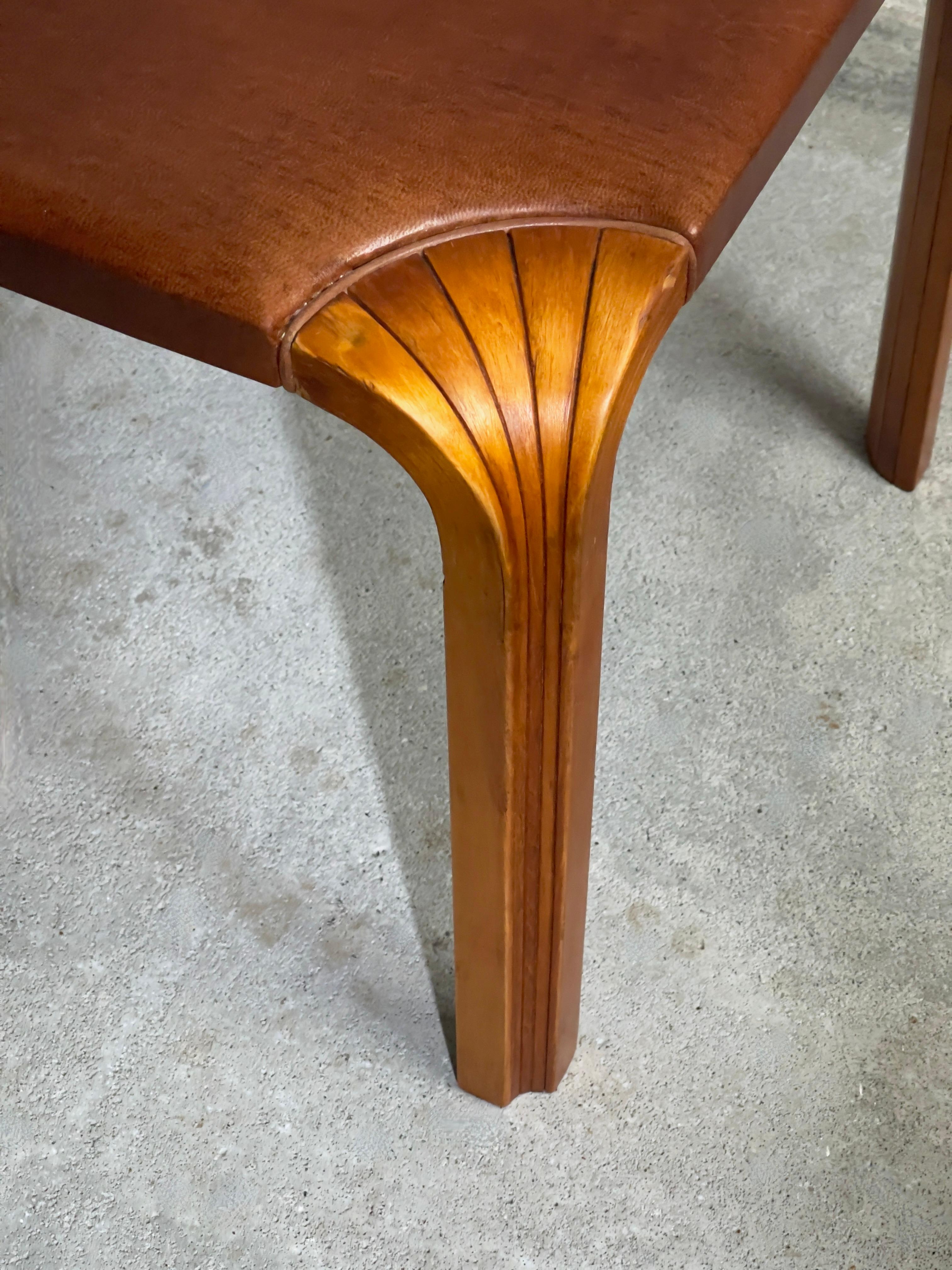 Leather 1954 Alvar Aalto stool model X601 in rich patinated birch and Niger leather For Sale
