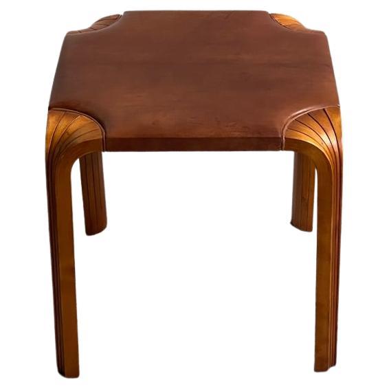 1954 Alvar Aalto stool model X601 in rich patinated birch and Niger leather For Sale