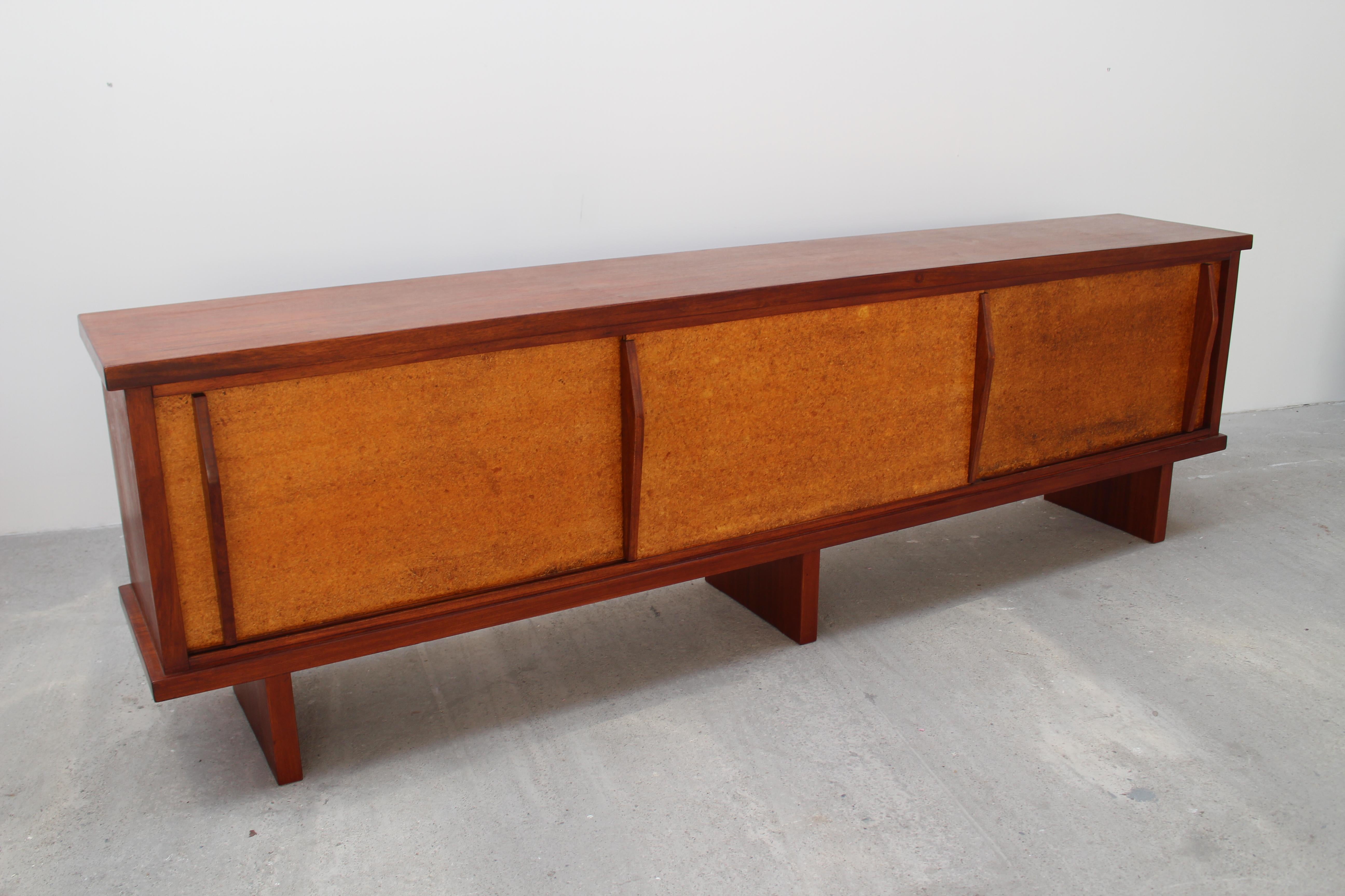 Sideboard solid mahogany wood.
1954. Original doors and system maded by Charlotte Perriand 
provenance : from city of Le Mans - building 