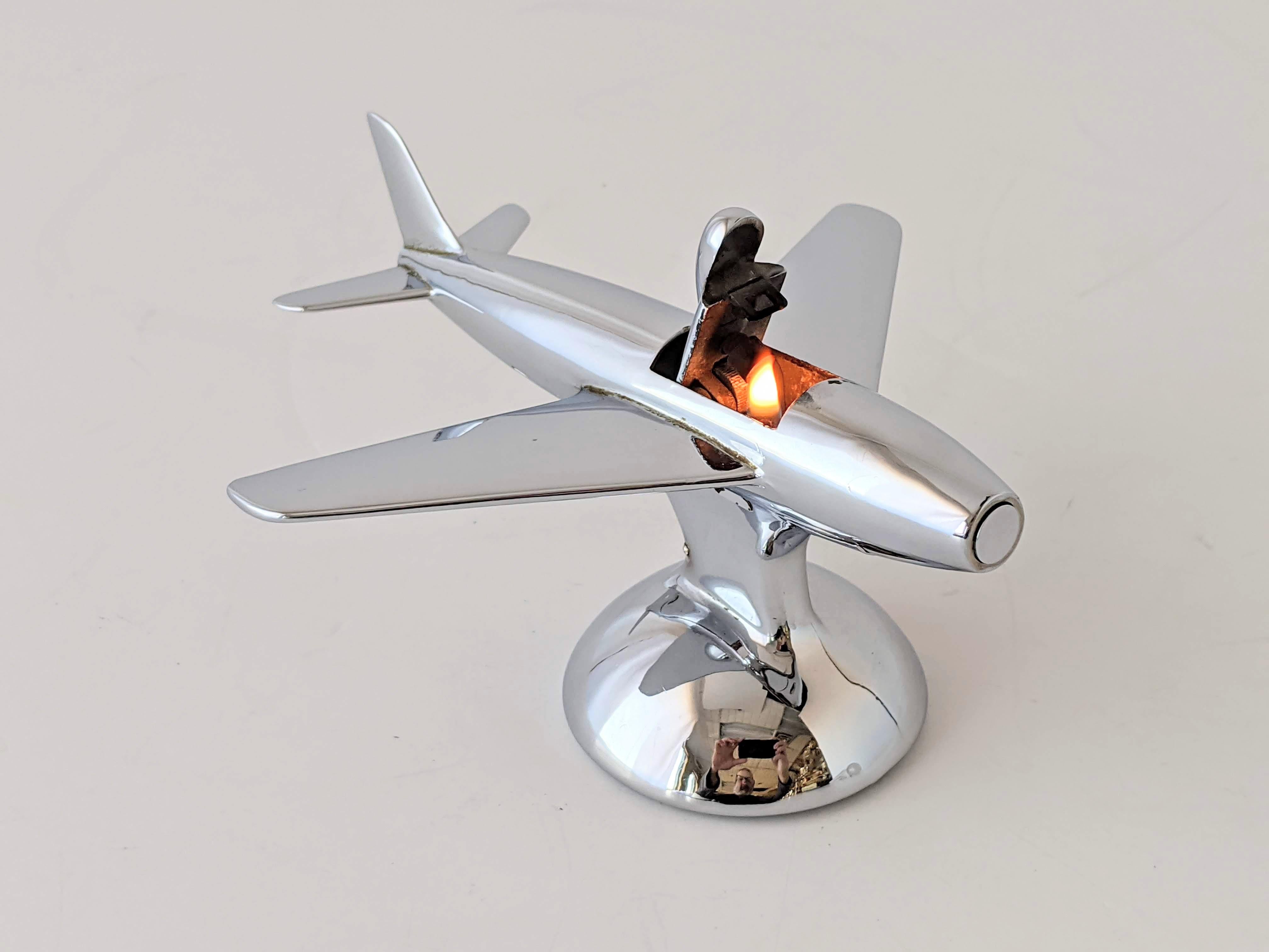 Dunhill Sabre Jet Fighter lighter, 1954.

The Dunhill 'Jet Plane' Lighter is depicting the famous North American Aviation F-86 Sabre a transonic jet fighter aircraft. The Sabrejet set its first official world speed record of 570 mph (920 km/h) in
