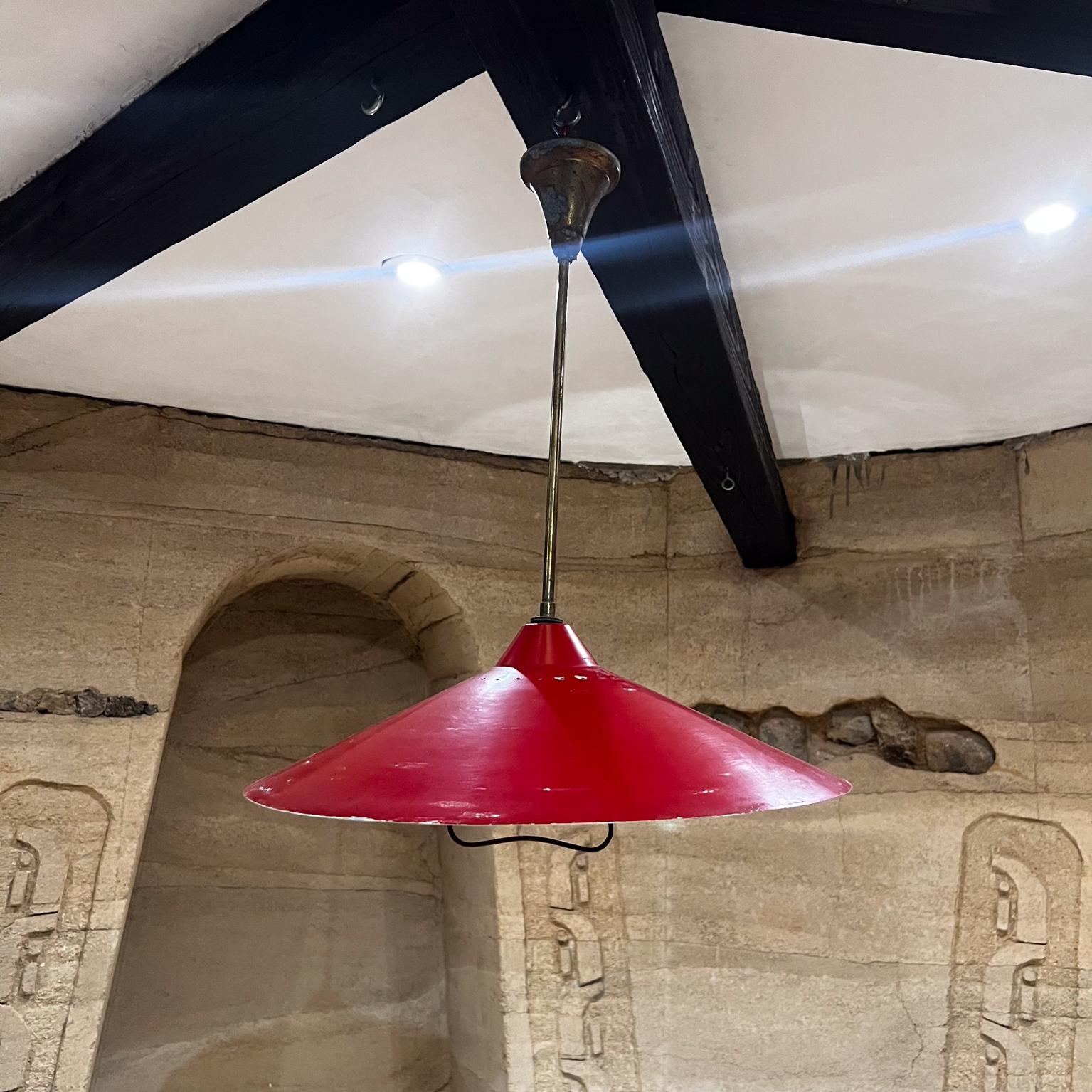 1950s Red Stilnovo Hanging Pendant Lamp Italy
in aluminum and brass
unsigned
18.75 diameter x 22.5 tall
Preowned original unrestored vintage condition.
Expect vintage wear, a few dents and dings on original paint.
Please see images.