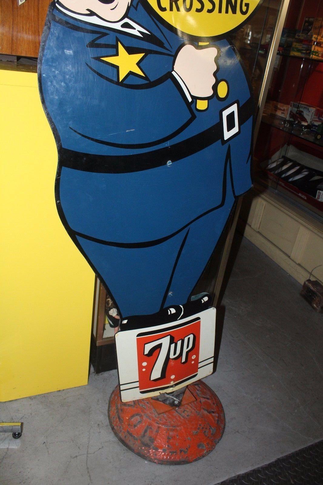 Double sided tin sign made by the Stout sign Co. St. Louis, MO. Mainly used near schools to advertising SLOW Children crossing. No.23 located towards bottom of sign.