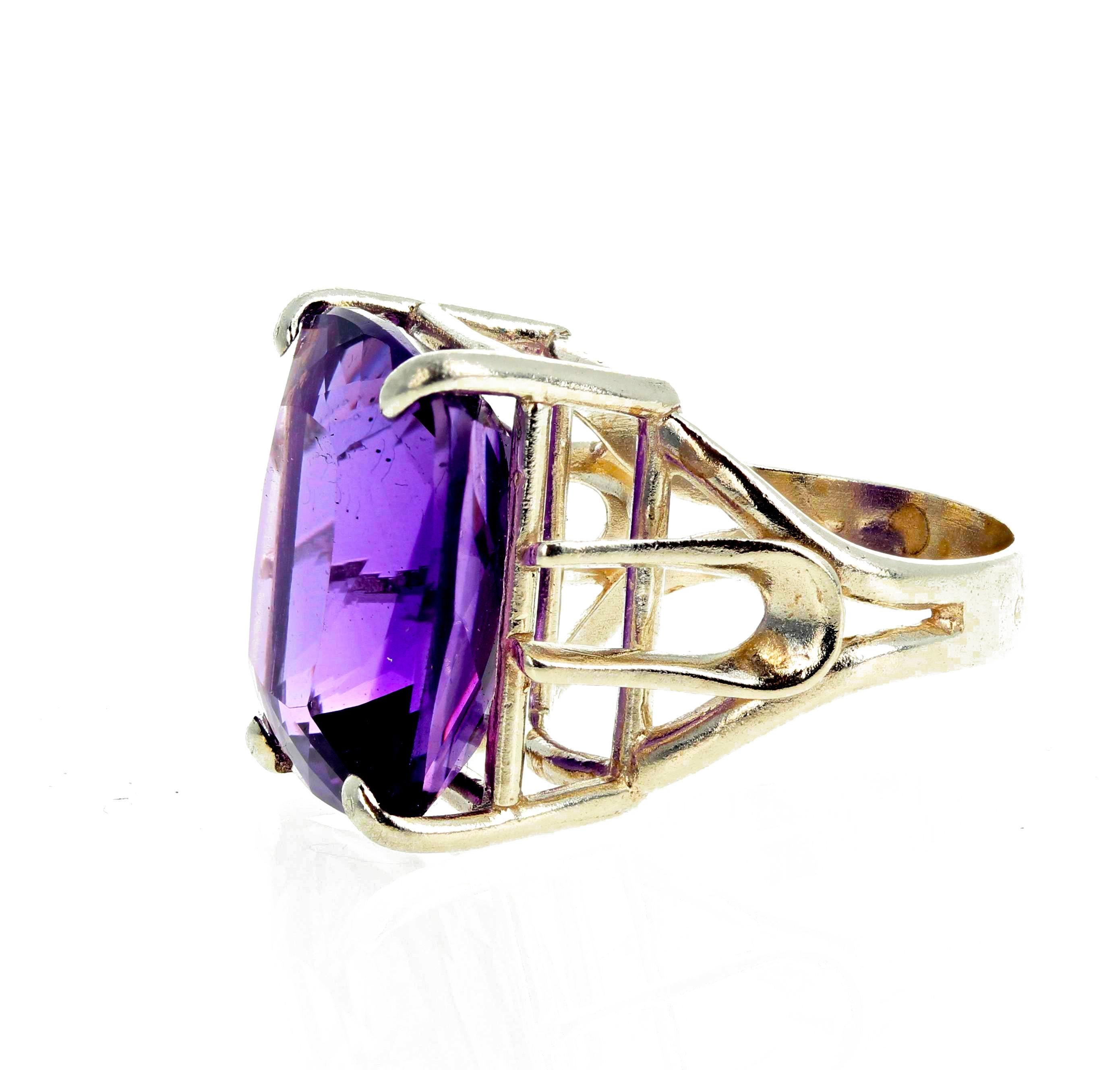 Gorgeous pinky flashing natural purple 19.55 carat Amethyst set in a Sterling Silver ring size 7 (sizable).  The Amethyst  is 19 mm x 15 mm and has no eye visible inclusions.   