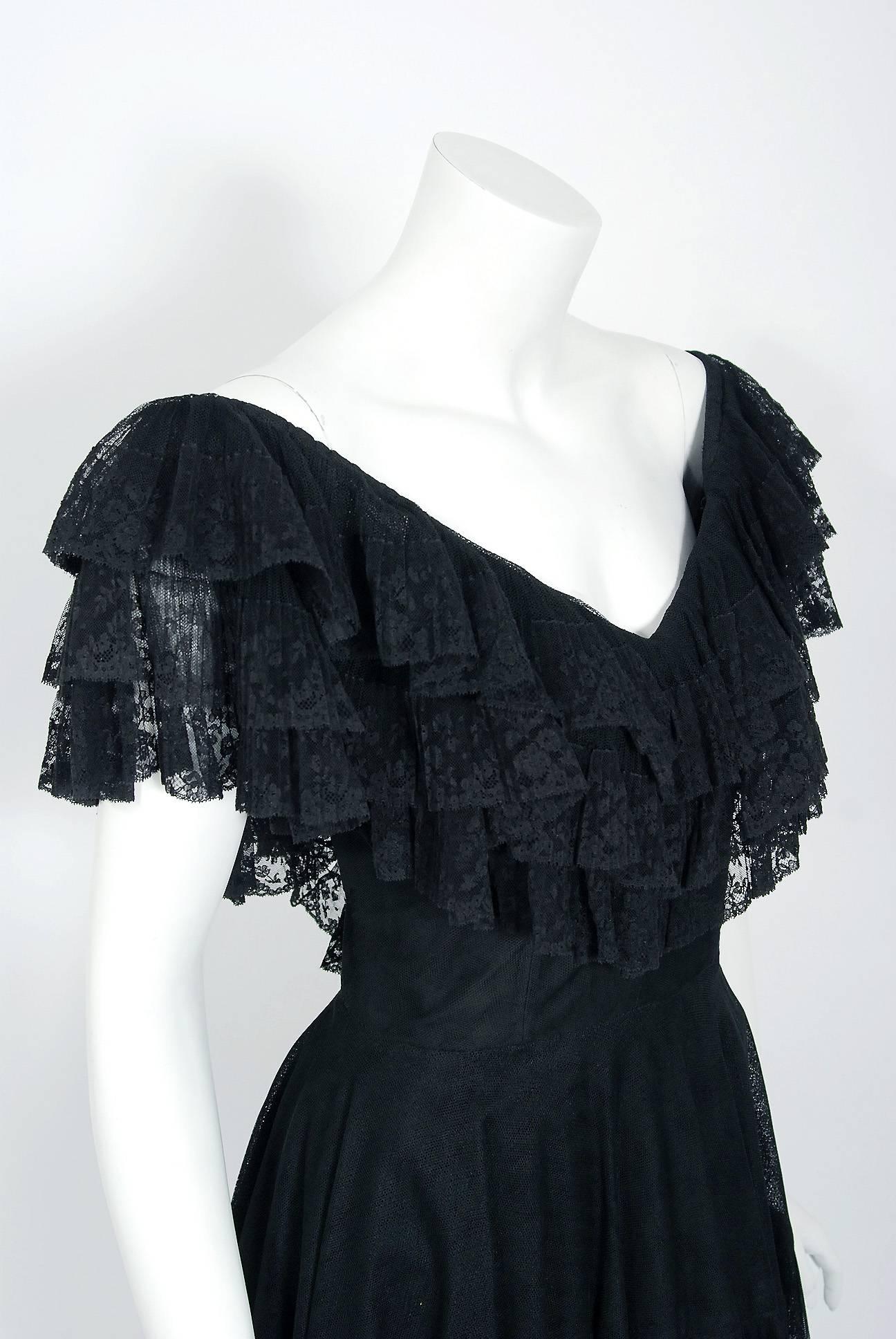 Breathtaking Jacques Fath Haute-Couture black lace dress dating back to the mid 1950's. Jacques Fath was a French fashion designer who was considered one of the three dominant influences on postwar couture, the others being Christian Dior and Pierre