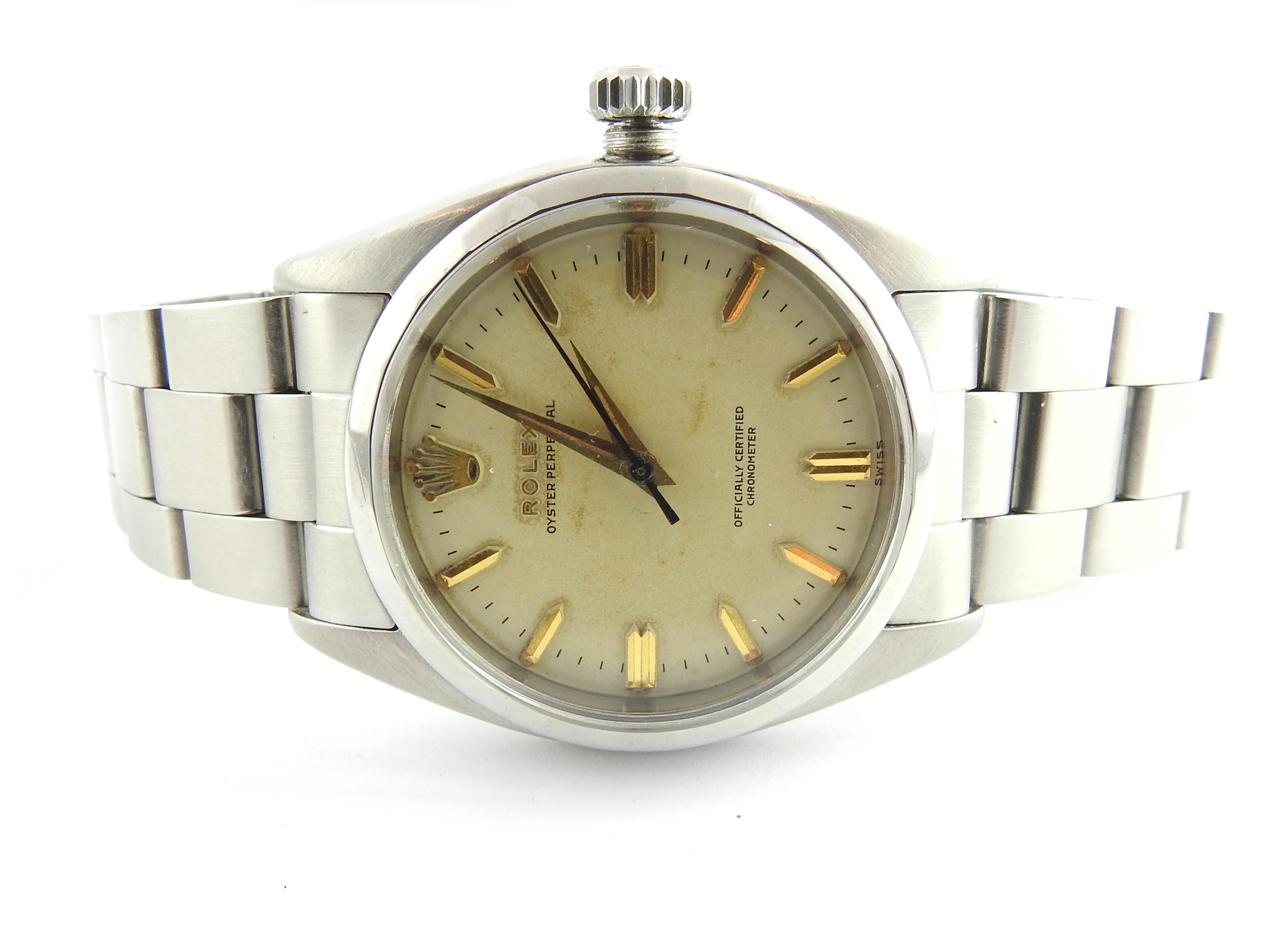 1955 Rolex Men's Watch

Model: 6586

Serial: 97860

Automatic movement

White Dial - gold markers. White dial has yellowed a bit with age.

Stainless steel case and band. White gold bezel

34 mm case

Fits up to 7 1/4
