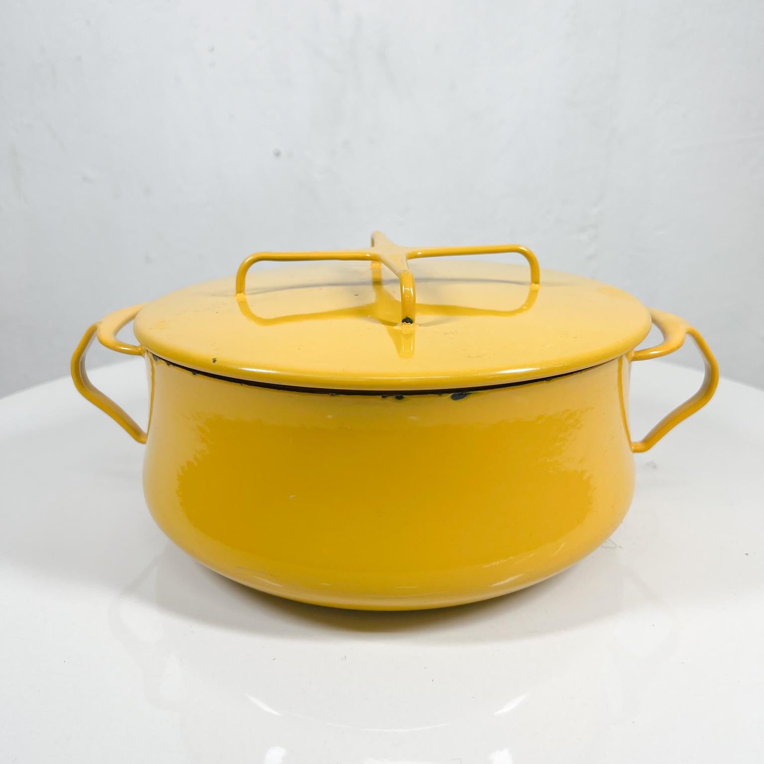 DANSK designs Yellow Enamelware Kobenstyle Casserole Pot and Cover Lid with TRIVET Top IHQ FRANCE
Designed by Jens Herald Quistgaard made in France, Kobenstyle Line introduced in 1956.
Maker stamp present.
6.75 tall x 8.5 diameter x 12
