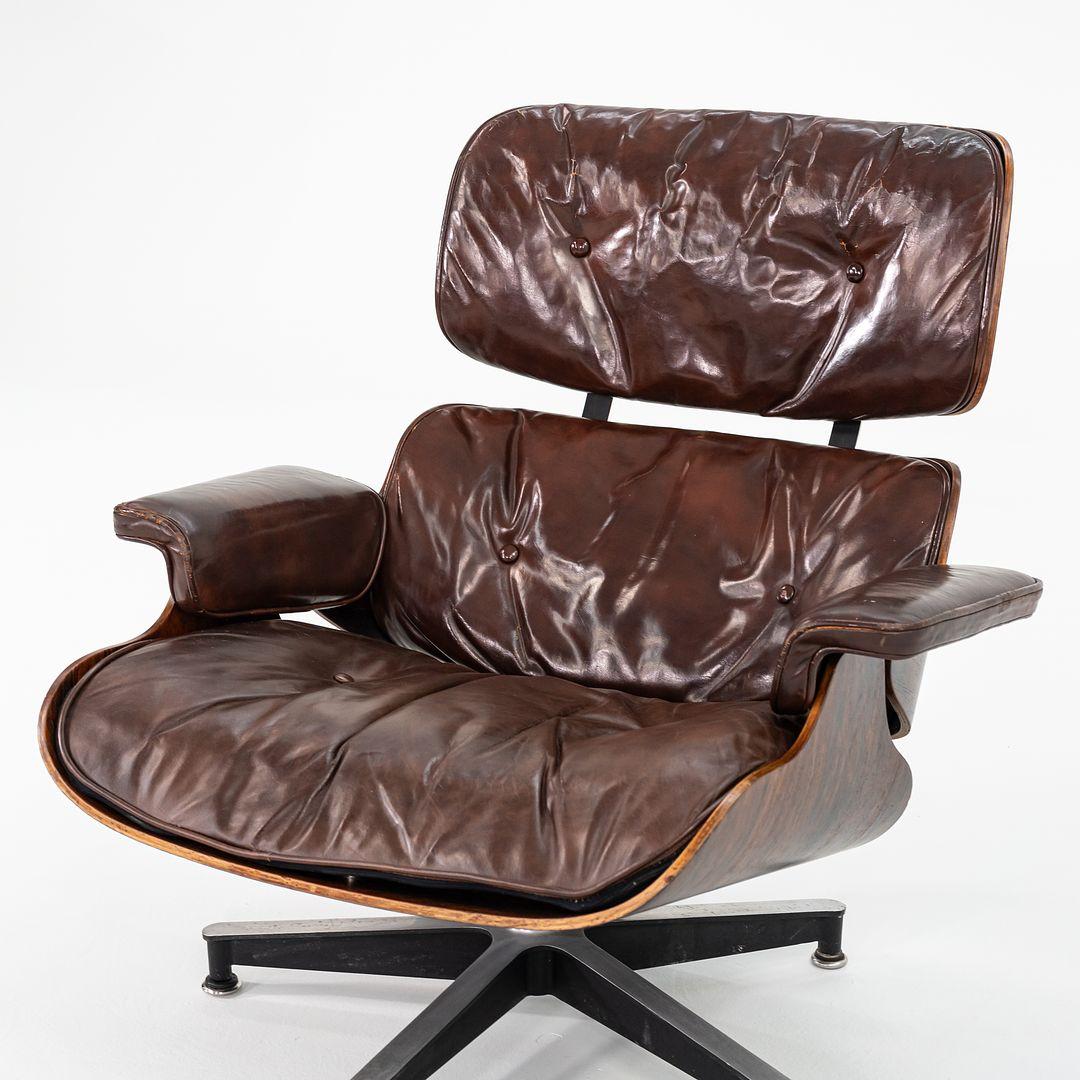 This is an original Eames Lounge Chair and Ottoman, models 670 and 671, initially designed by Charles and Ray Eames in 1956. These are exceptional early examples and feature freshly-refinished Brazilian Rosewood panels. The upholstery is done in a