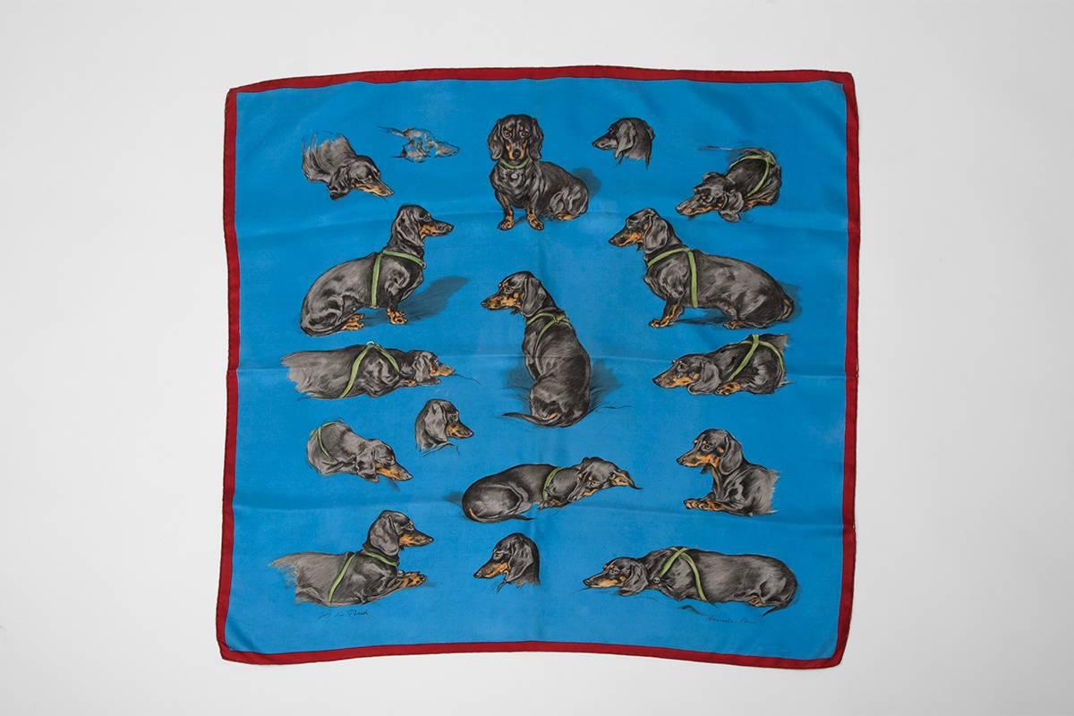 Extremely rare Hermès “Bassets Allemands” (dachshunds) silk twill Carré scarf. Signed by Xavier de Poret and issued in 1956, this dachshund design remains an “one-of-a-kind” Carré scarf for any serious Hermès collector. Xavier de Poret (1897-1975)