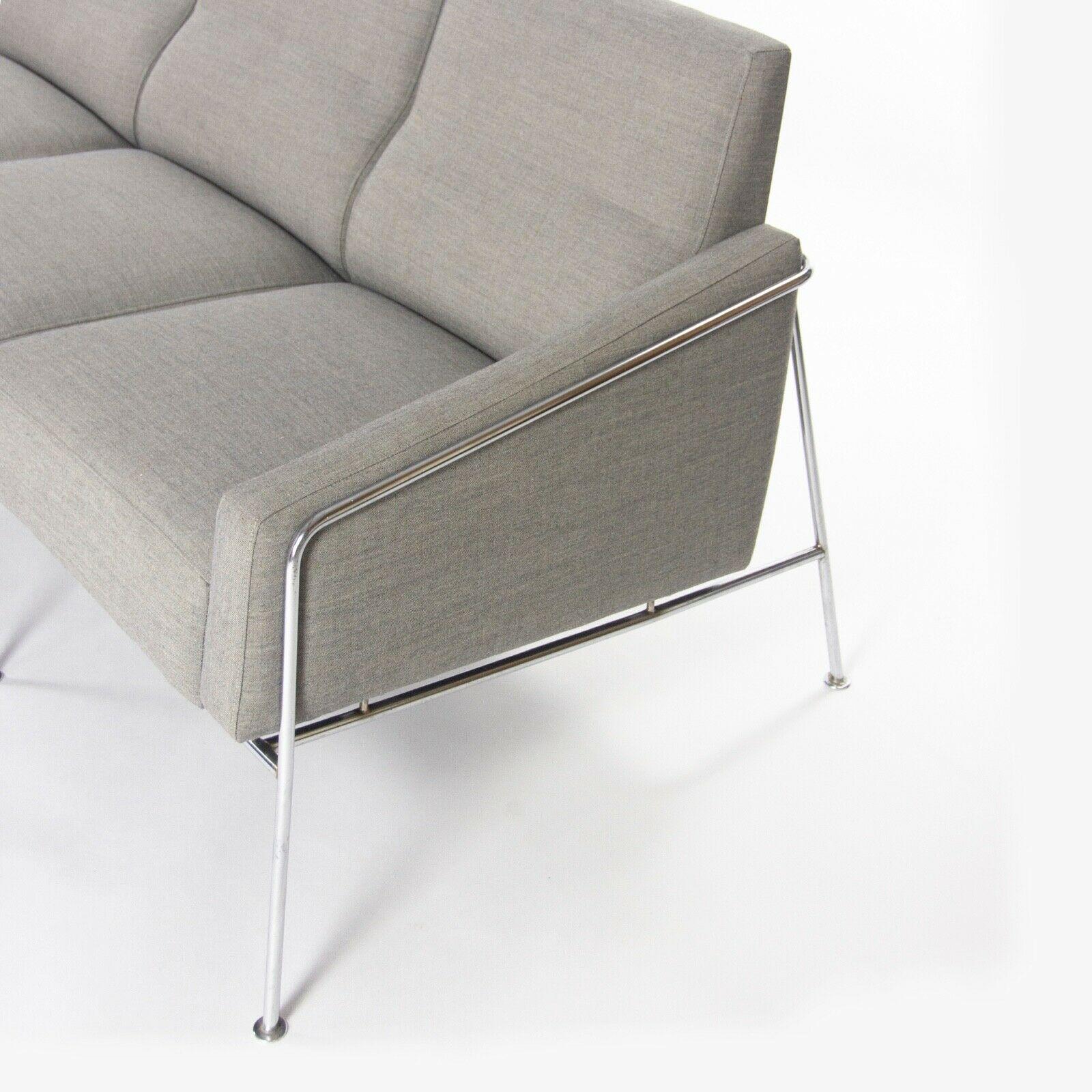Listed for sale is a Model 3300/4 sofa, designed by Arne Jacobsen for Fritz Hansen of Denmark. This examples was produced circa 1957. While it is more common to see the single-seater, loveseat, or three-seat sofa, this is a far rarer 89 inch
