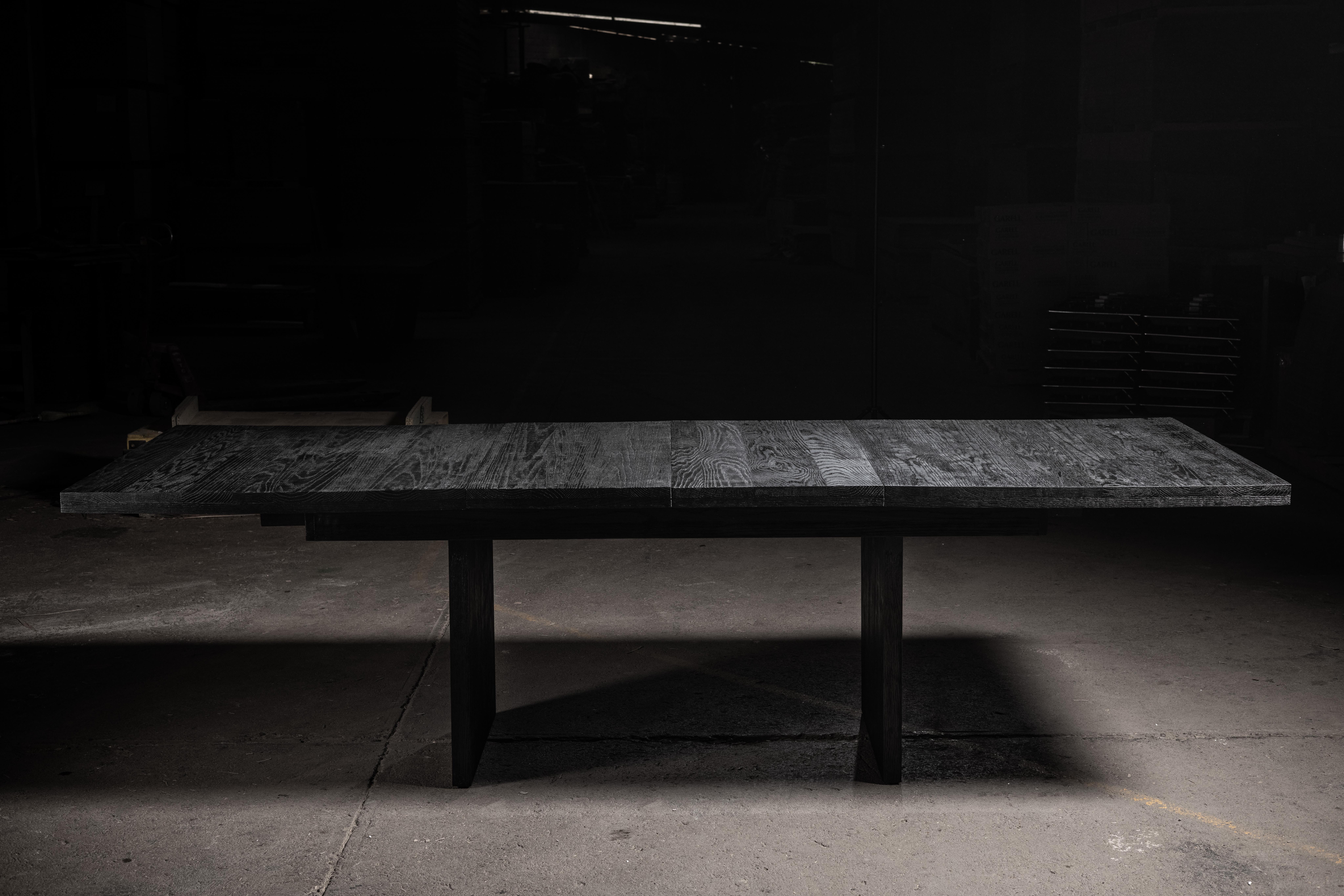 Handcrafted extendable black oak dining table goes from 72