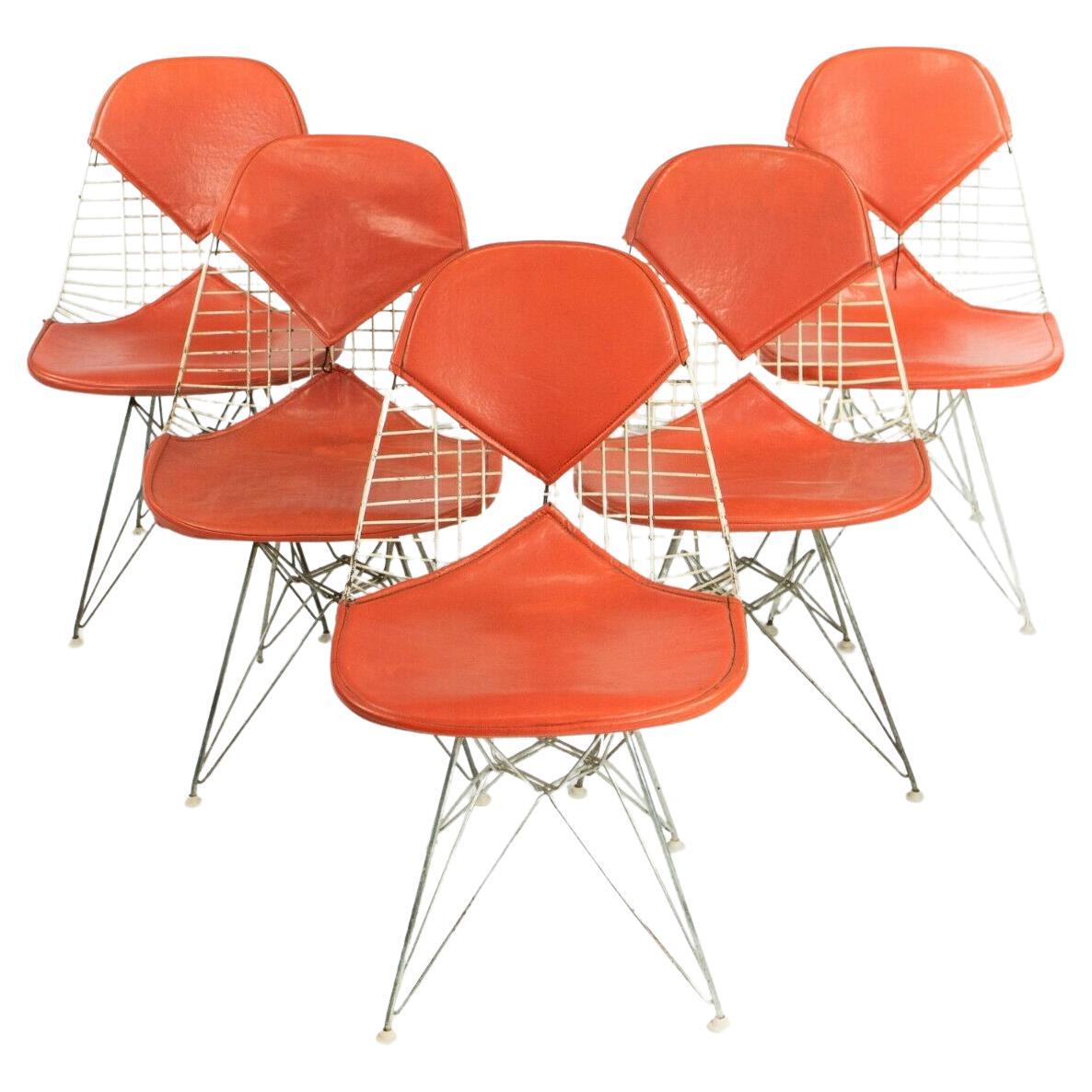 1957 Herman Miller Eames DKR-2 Ess-/Beistellstühle, Fünfer-Set mit orangefarbenen Polstern