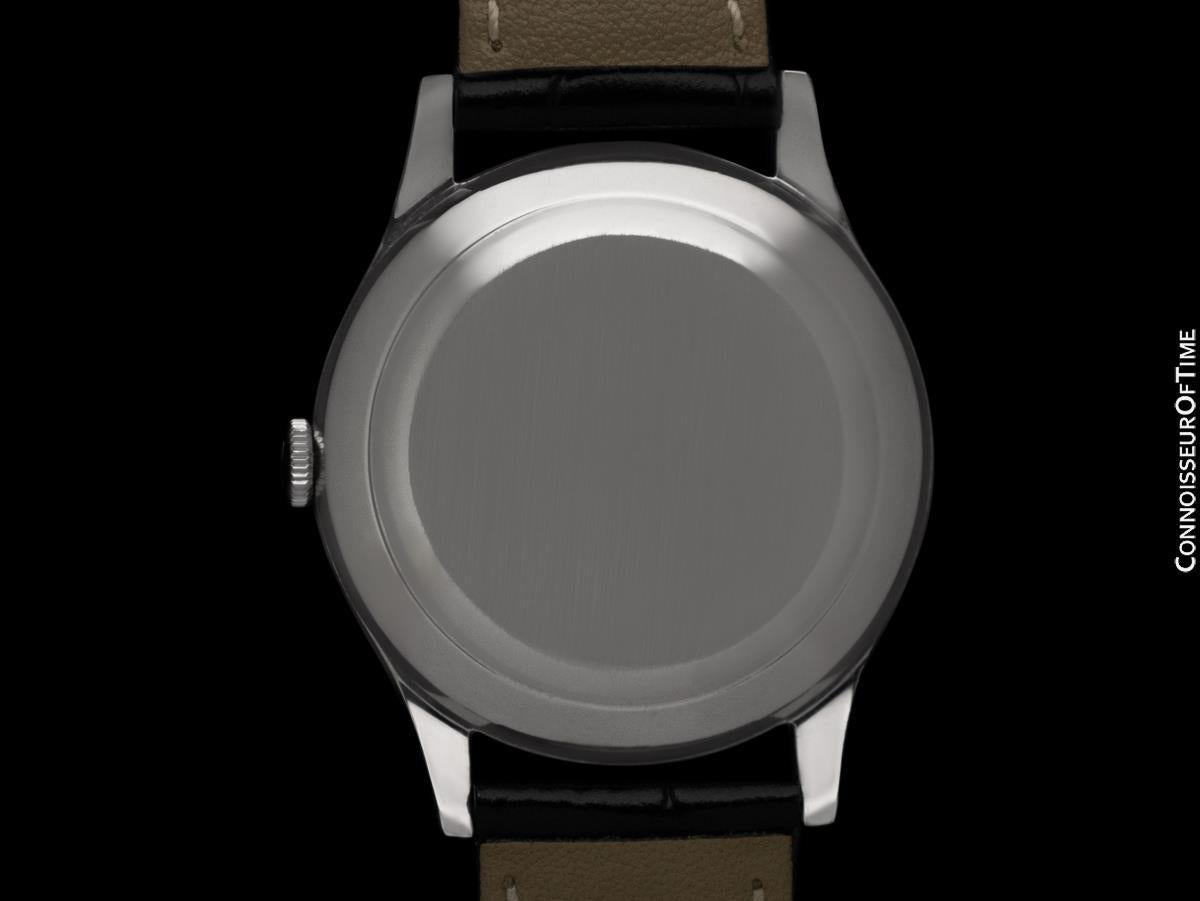 1957 Montre Vintage By IWC pour homme, Cal. 852 Automatic - Acier inoxydable

Magnifique état restauré - Mouvement utilisé dans l'Ingenieur - 1 an de garantie

La très belle IWC automatique méticuleusement restaurée avec cadran à vignettes noir