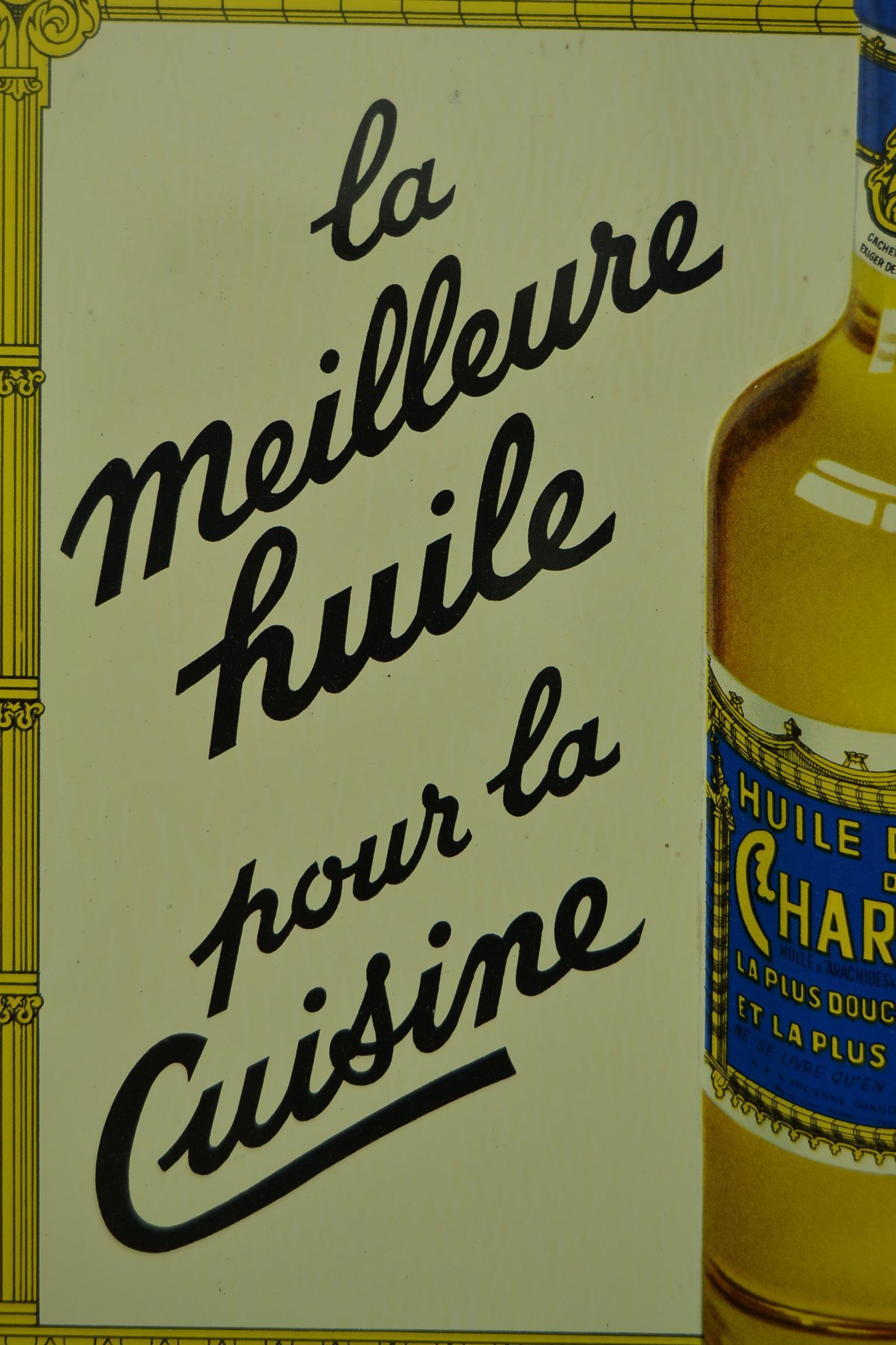 Tin advertising sign for table oil Chartreux dated 1957.
This great looking Tin sign - Tin board - Metal sign
was made for the best table oil - kitchen oil of the brand Chartreux.
It was made in Belgium by Etabl. J. Schuybroek - Hoboken - Antwerp