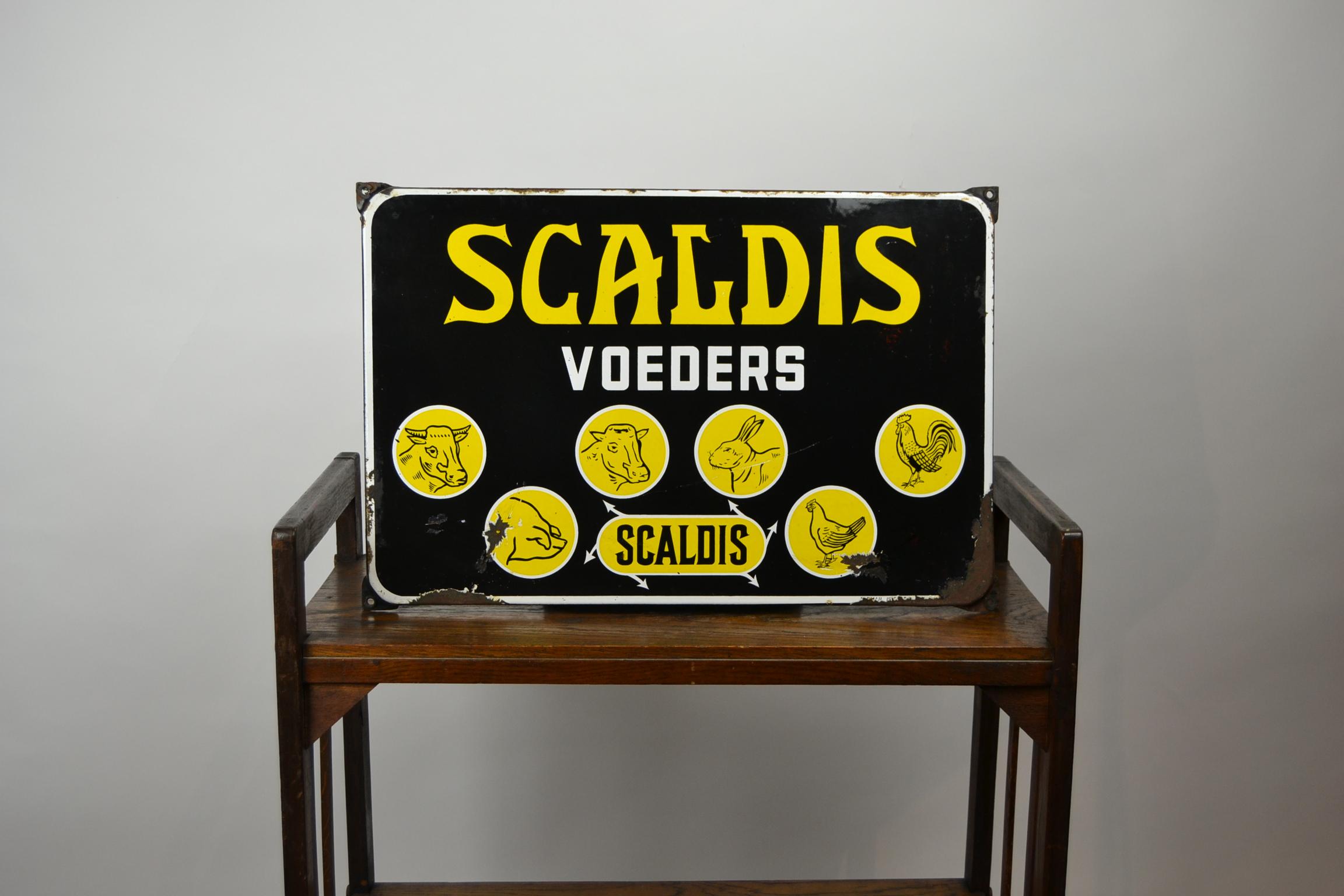 Vintage enamel sign - Porcelain sign - Display sign - Wall sign
for Animal Nutrition by Scaldis Belgium.
Made by Email. Koek, 1958 Bruxelles - Belgium.
Images from a cow, pig, rabbit, bull, cock and hen.
Colors black, white and yellow.
The Sign