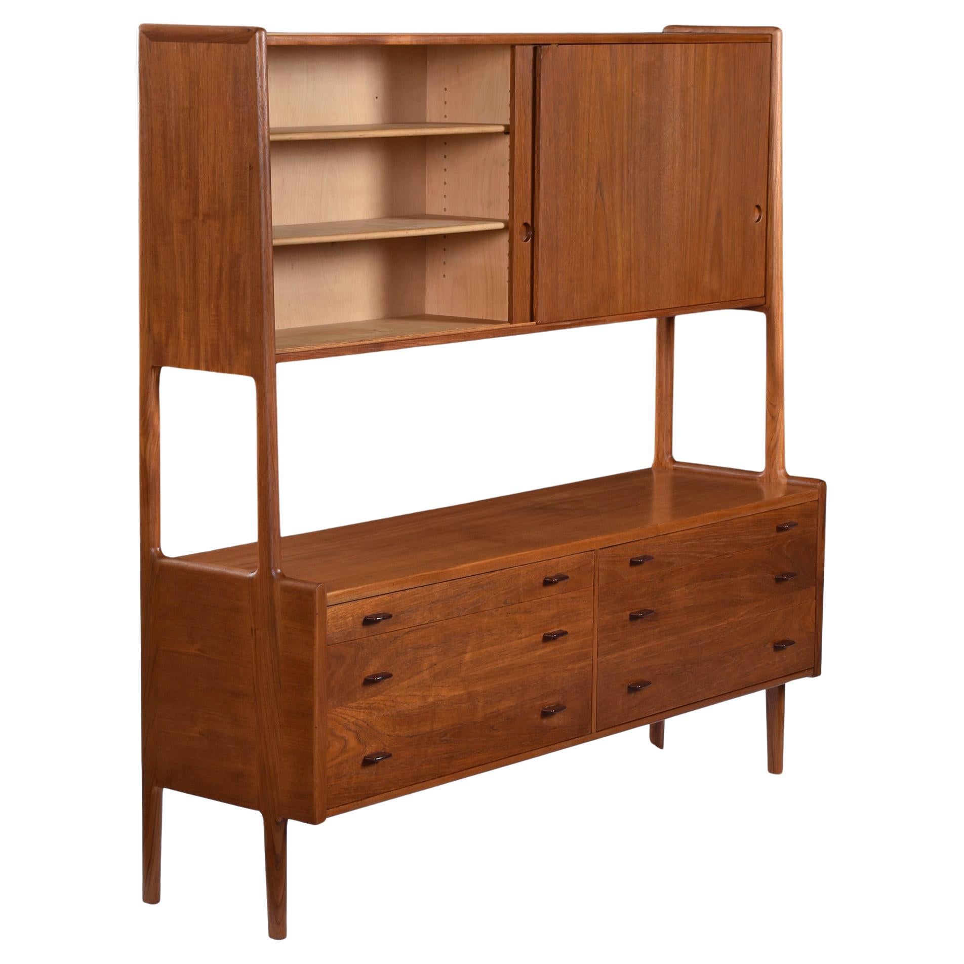 Born on April 22nd in 1958, this free-standing wall-unit / hutch is truly an architectural masterpiece.  The entire construction can be easily broken down and assembled without any hardware.  The top and bottom cabinets lock and slide into the