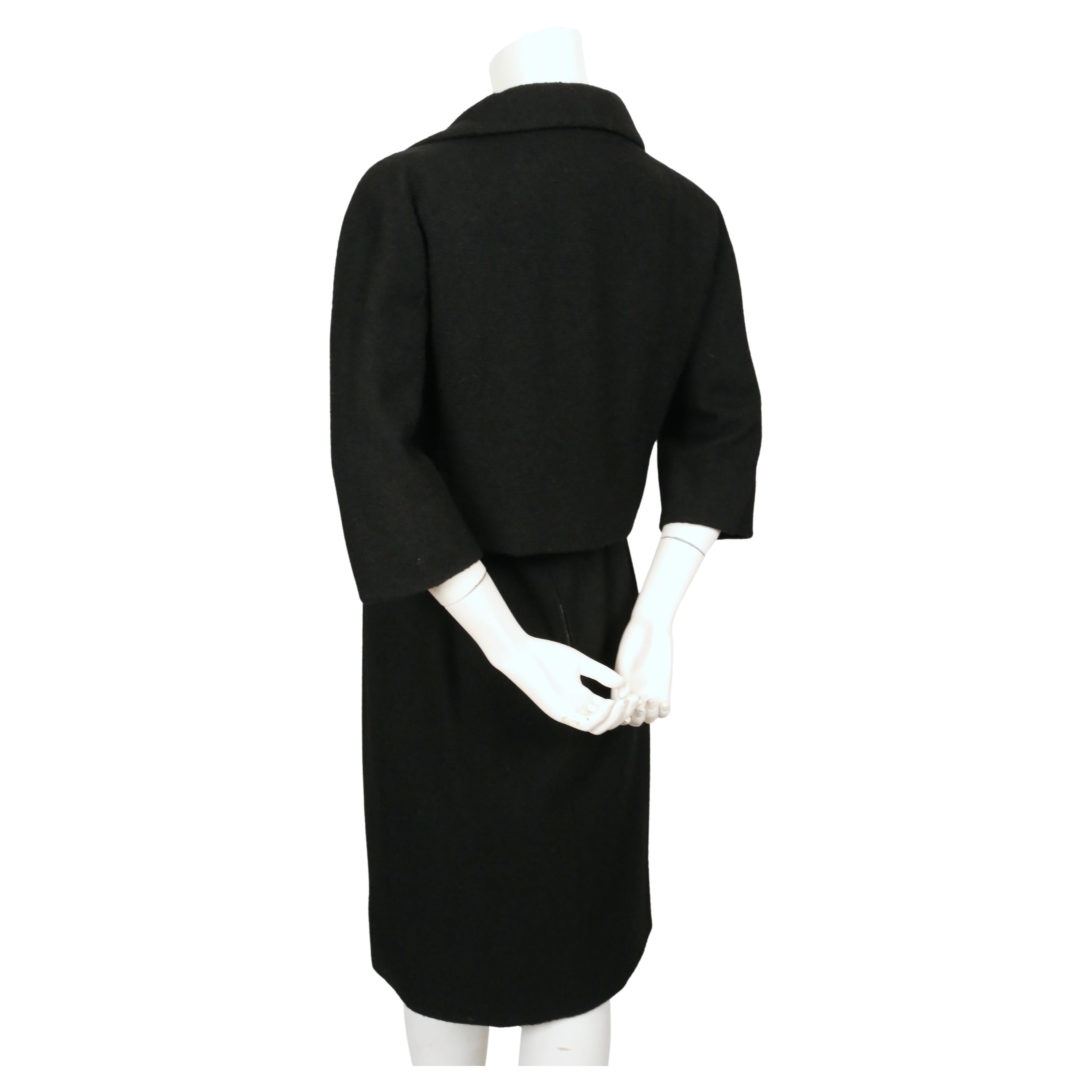 1958 EISA by CRISTOBAL BALENCIAGA haute couture tailleur jupe en laine bouclée noire Unisexe en vente