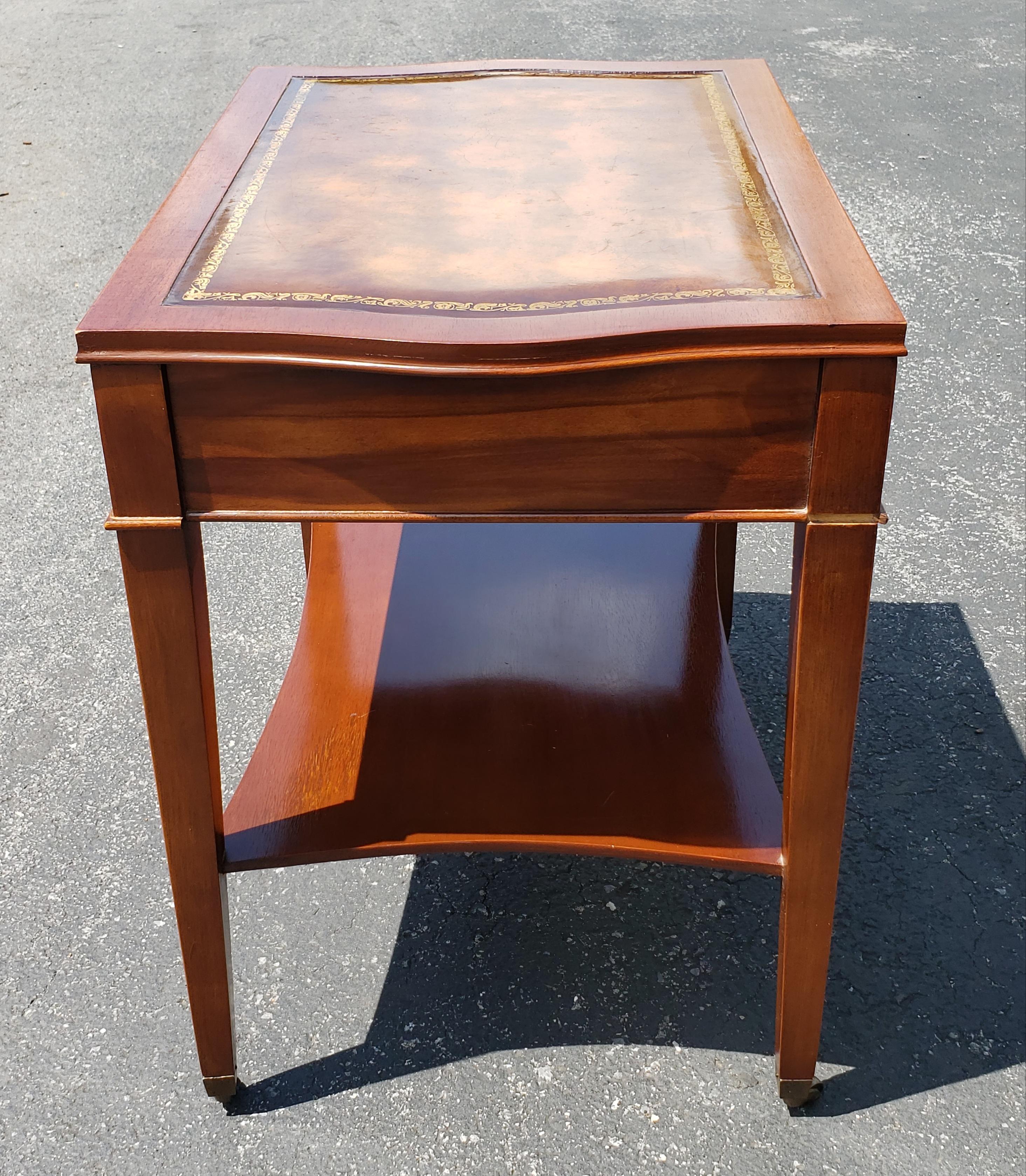 Stained 1958 Hollywood Regency Mahogany Inlay Tooled Leather Top and Gilt Stencil Tables For Sale