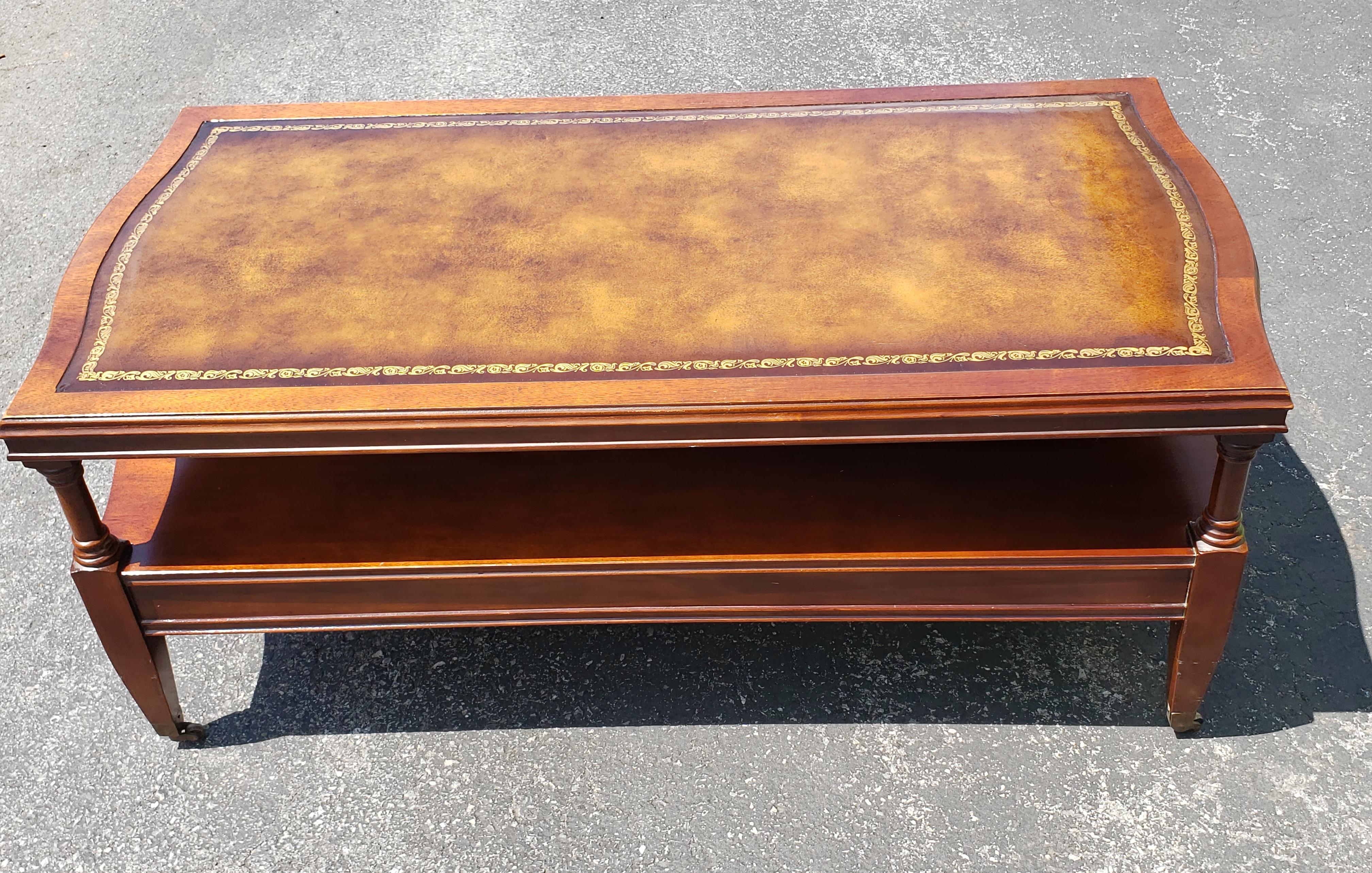 American 1958 Hollywood Regency Mahogany Tooled Leather Top and Gilt Stencil Coffee Table For Sale