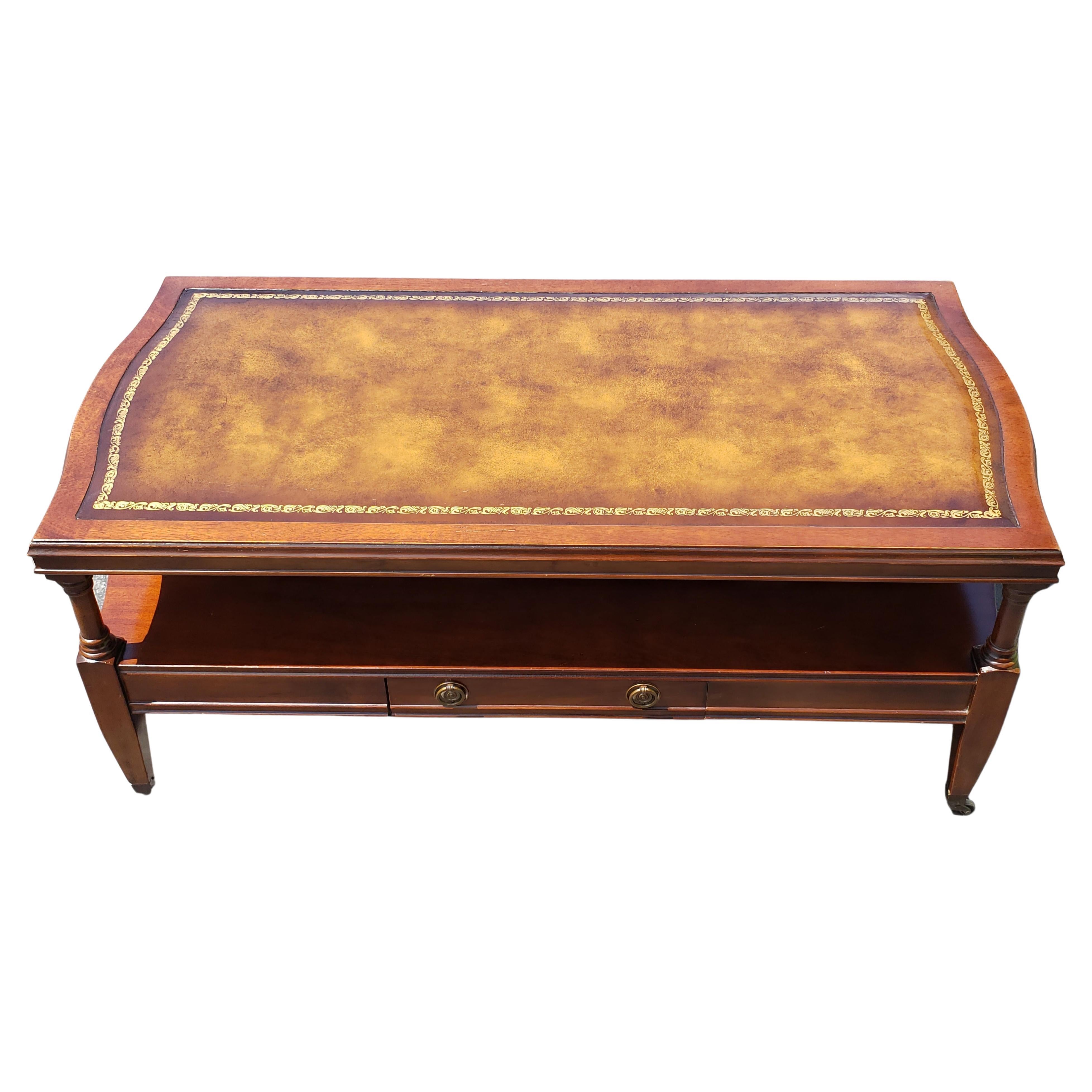 1958 Hollywood Regency Mahogany Tooled Leather Top and Gilt Stencil Coffee Table For Sale