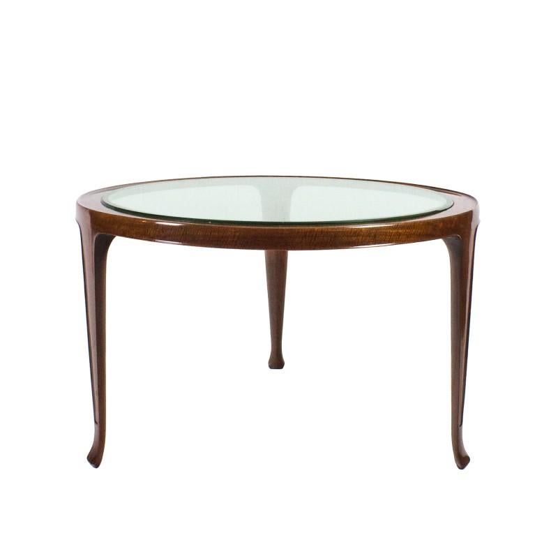 Large tripod coffee table, solid mahogany, French polish, and a very thick original glass.
Attributed to Guglielmo Ulrich.

Italy, 1948.