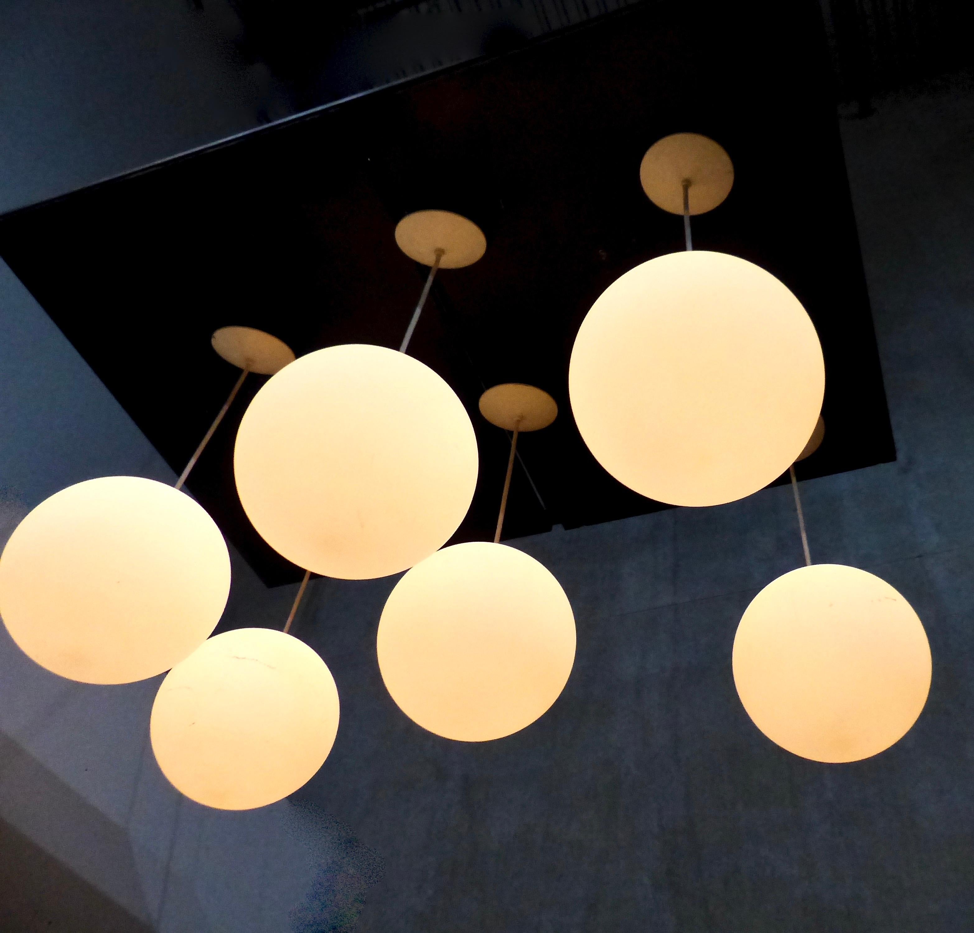 Mid-Century Modern 1958 Modernist Milk Glass Globe Pendant Lights 