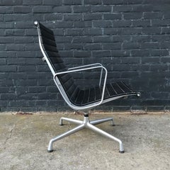 1958, Ray & Charles Eames for Vitra Lounge Chair EA 116 in Black Leather