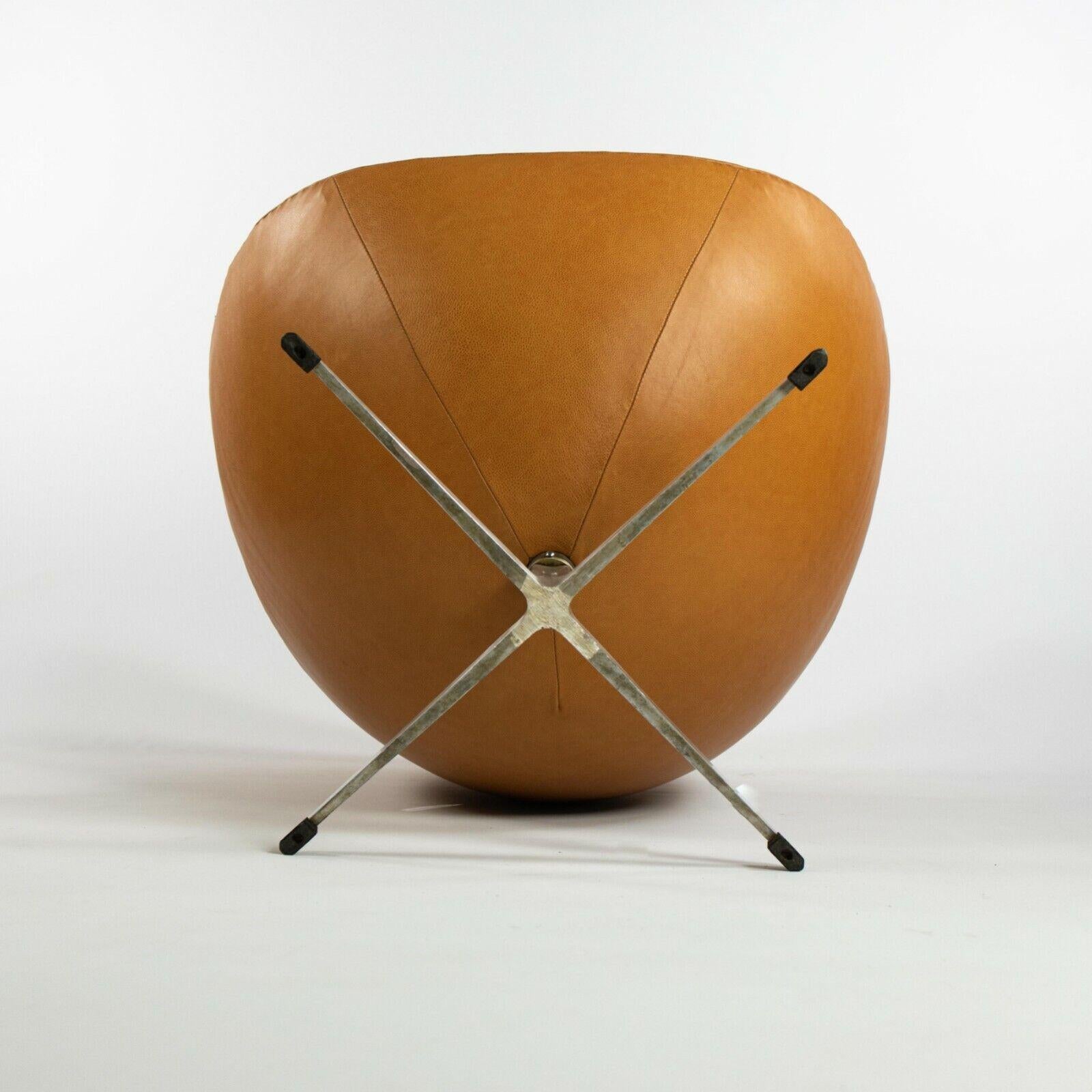 We present an exceptionally rare and original egg chair and ottoman, designed by Arne Jacobsen and produced by Fritz Hansen in 1959. This set came from a period-correct home and estate in New Jersey full of original George Nakashima furniture, which
