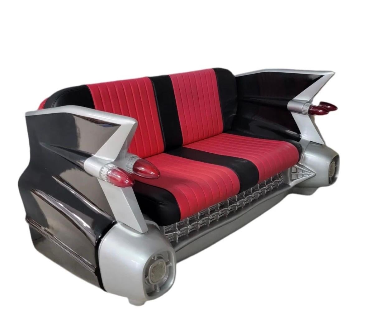 1959 Cadillac Style Sofa — Iconic Automotive-Inspired Design

This striking 1959 Cadillac style sofa is a true statement piece, designed to replicate the unmistakable rear section of a classic 1959 Cadillac DeVille—complete with dramatic tailfins