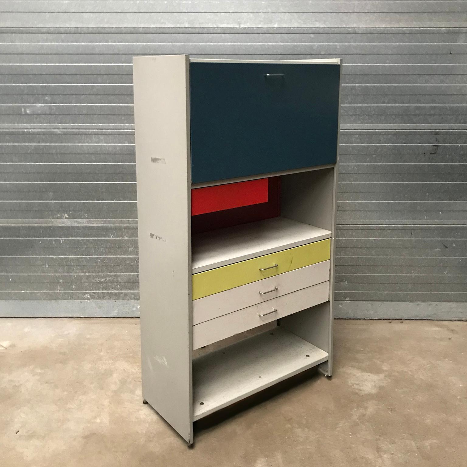 This cabinet is part of the private collection of Casey Godrie and is situated in his private house. 
Ask him for competitive shipping quotes. His incredible Dune Villa, Amsterdam Beach, check last two pictures of this listing or  find more details