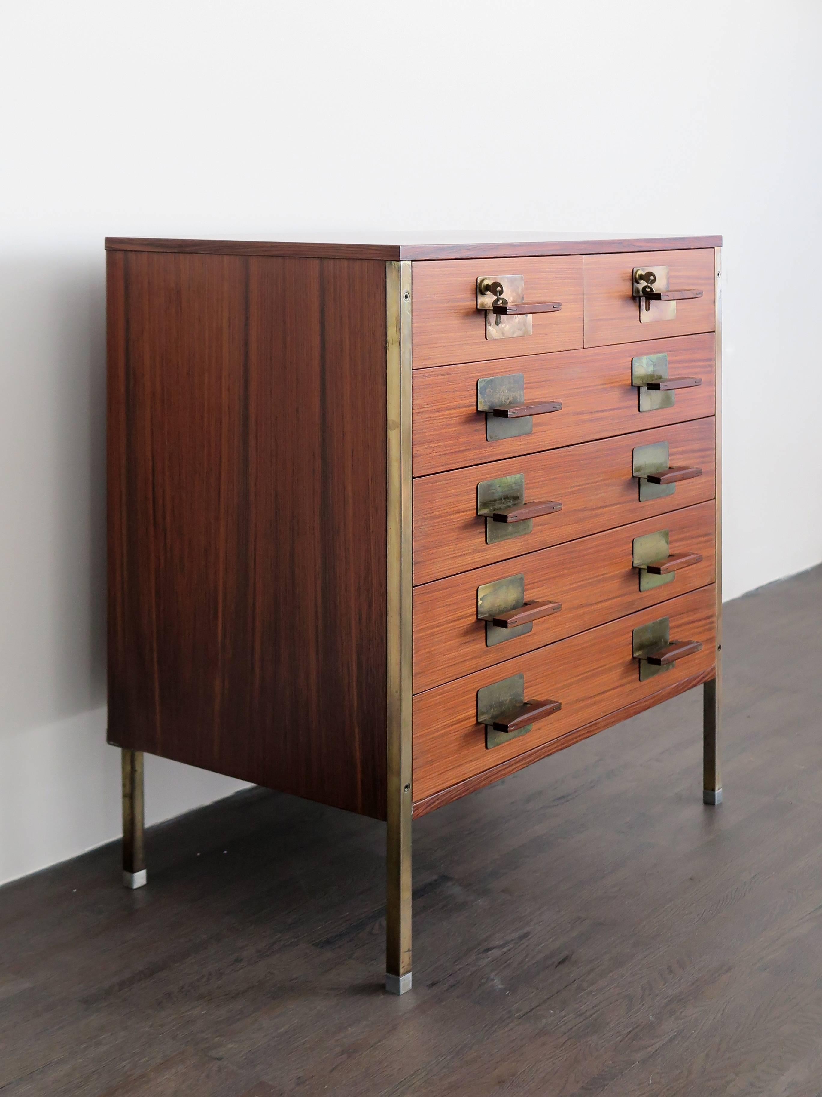 Italian very rare chest of drawers series Positano designed by Ico Parisi and manufactured by MIM (Mobili Italiani Moderni) in 1959.
Varnished steel, brass, and rosewood wood veneer with original keys and manufacturers label.