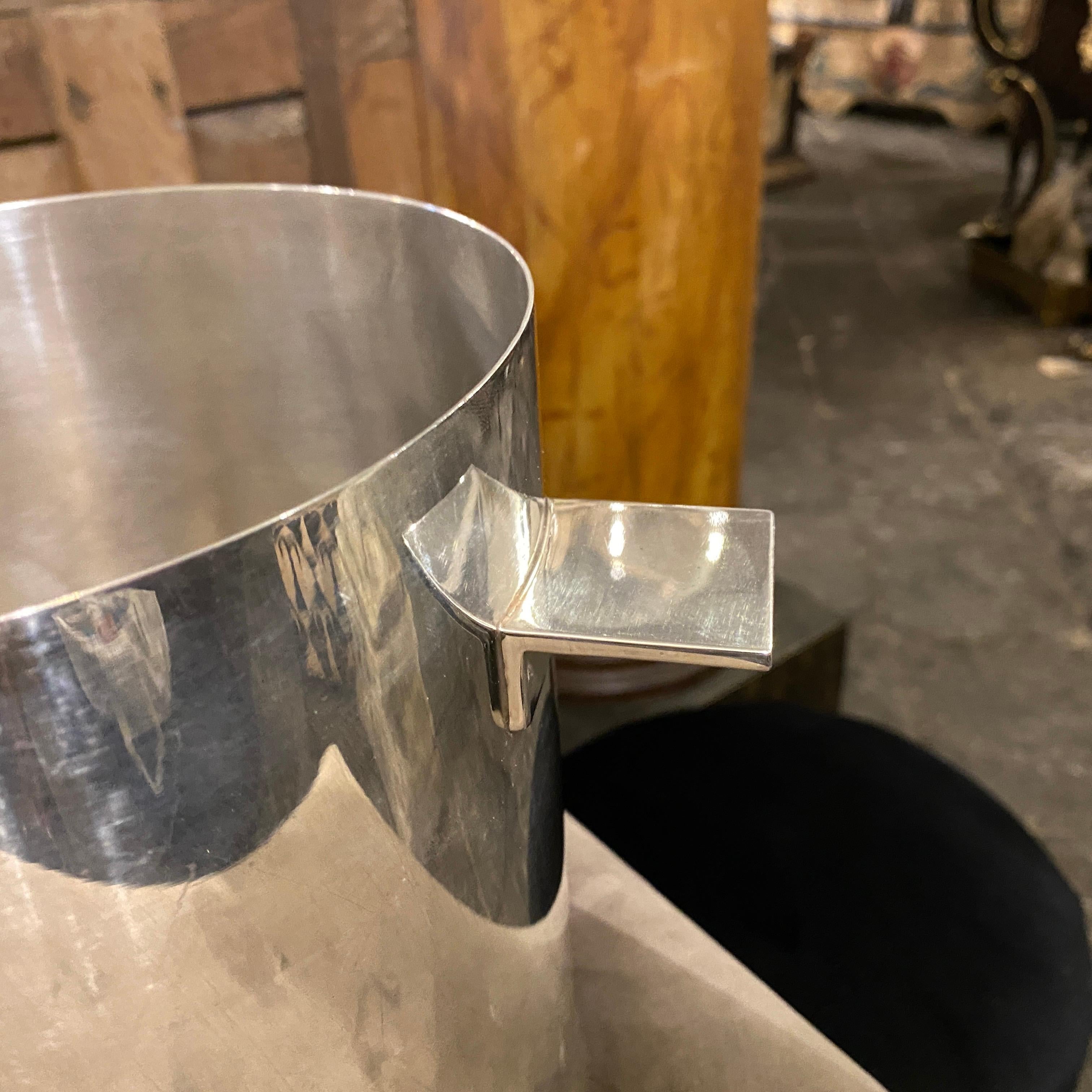 An iconic silver plated wine cooler made in France by Christofle, designed by Lino Sabattini. It's in good vintage conditions, marked on the bottom.