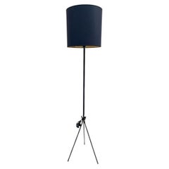 195à's Stitched leather floor lamp by Jacques Adnet