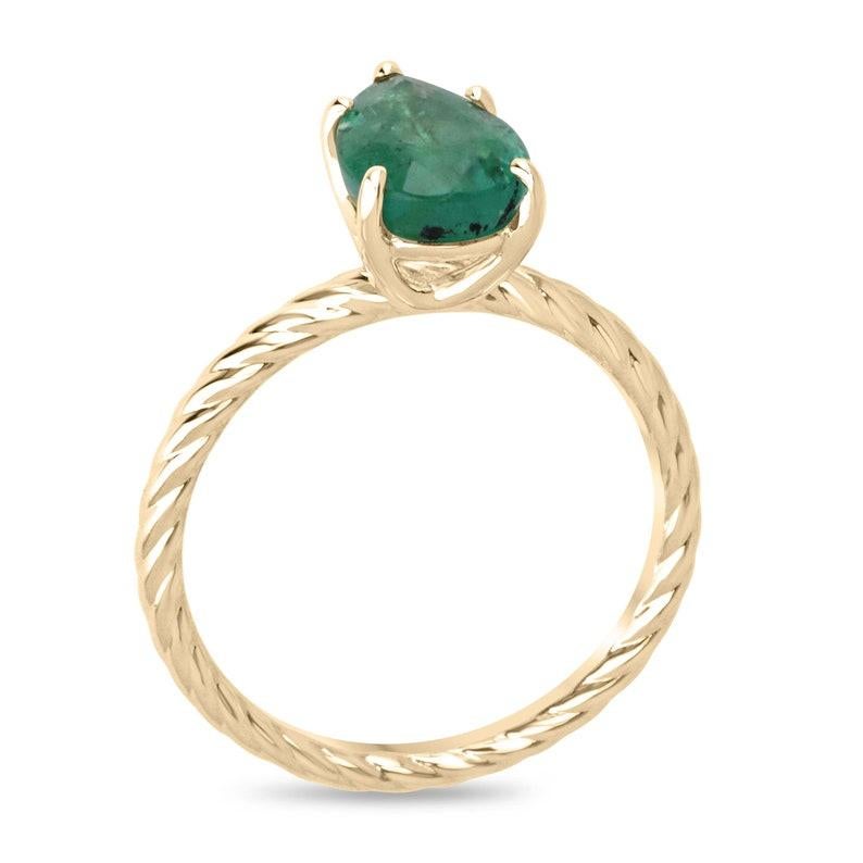 Discover the allure of our emerald solitaire ring, featuring a 1.95-carat pear-cut emerald set in a secure five-prong setting. This exquisite gemstone displays a medium green color, semi-transparent clarity, and good luster, perfectly complemented