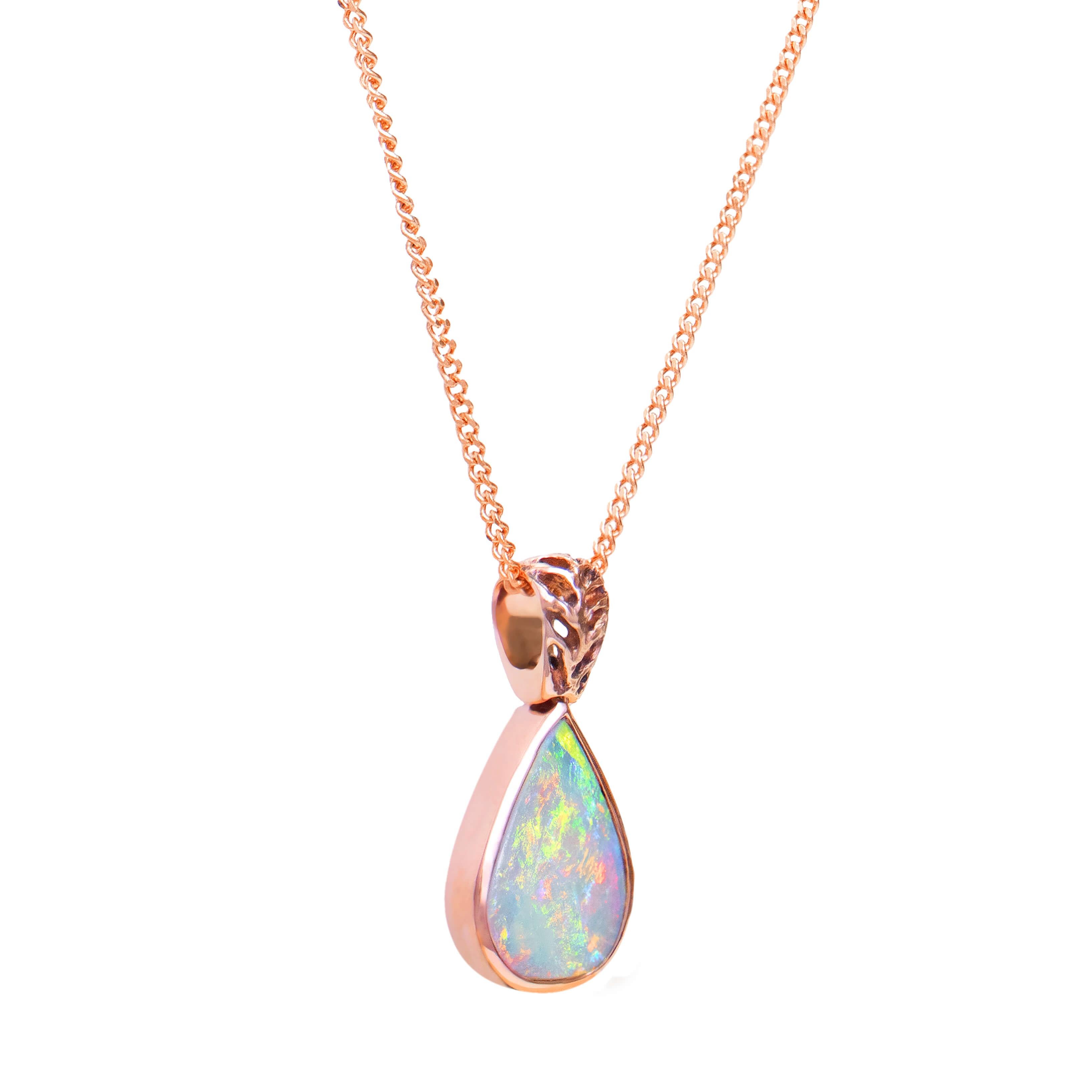 A very pretty necklace with an equally beautiful crystal opal. This necklace is solid 18k rose gold featuring a solid Australian Crystal Opal at it heart. The setting also includes a solid 18k rose gold chain. 

SPECIFICATIONS
Opal Type: Crystal