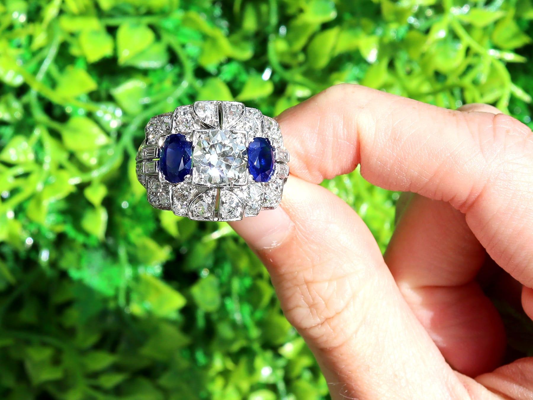 A stunning, fine and impressive antique 1930s 1.95 carat Basaltic sapphire and 4.15 carat diamond, platinum dress ring; part of our diverse collection of unheated sapphire rings.

This stunning, fine and impressive antique sapphire and diamond ring