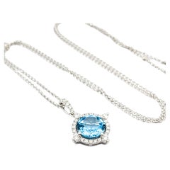 Pendentif en or blanc 1,95ct Topaze et diamant avec chaîne