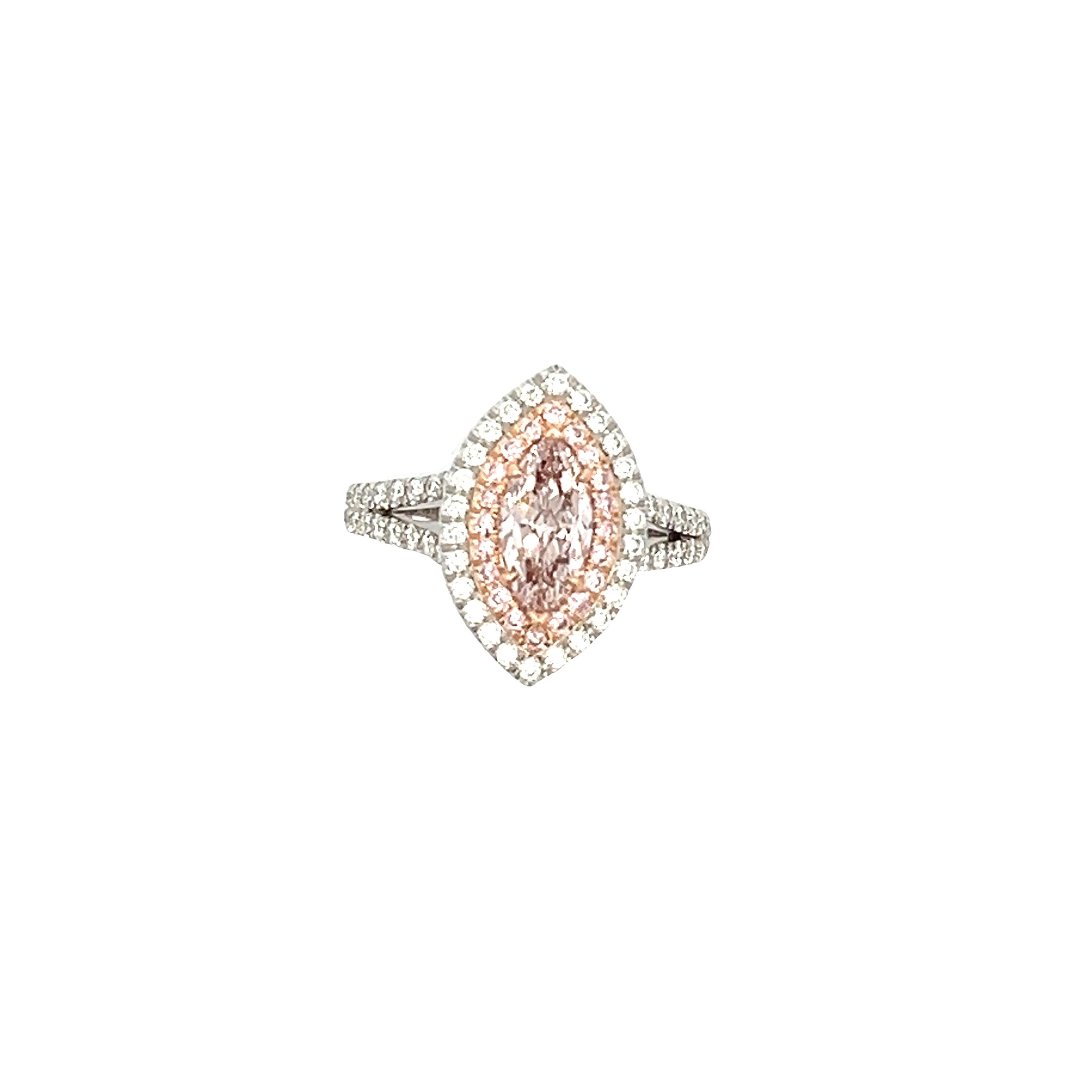 Behold this magnificent handmade Diamond Ring, featuring a stunning 1.01-carat Fancy Light Pink Marquise Modified Brilliant shaped Diamond with SI1 clarity. This awe-inspiring masterpiece is surrounded by 0.16 carats of Natural Pink Round-cut