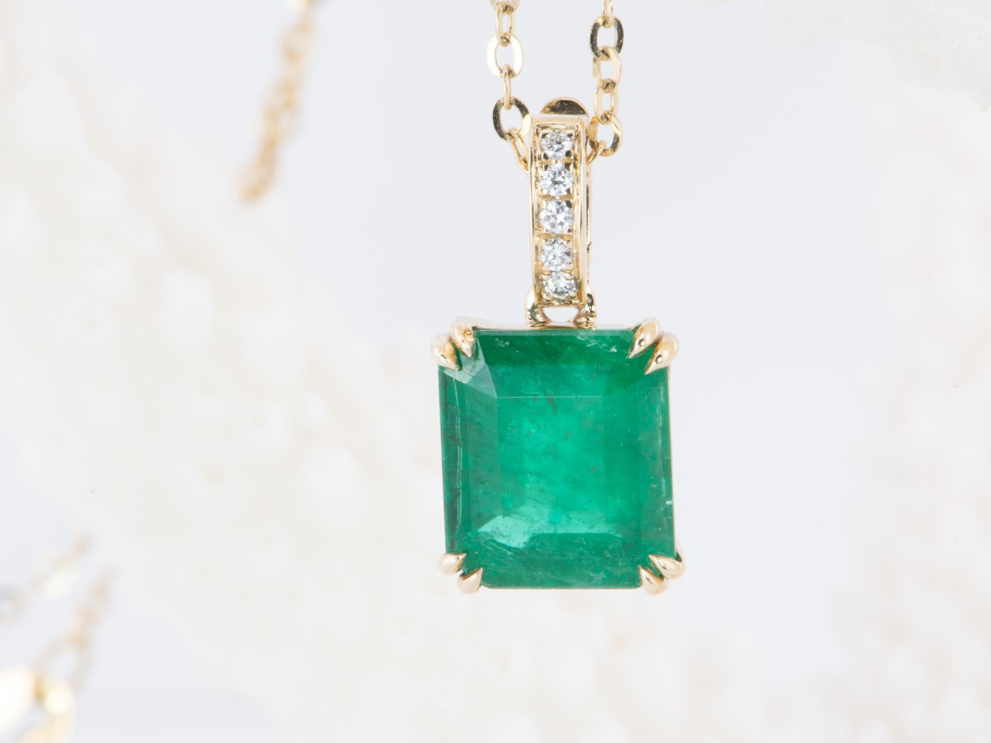 ♥ Solid 14K gold pendant set with a stunning emerald in the center, finished with a diamond-accented bail that can be opened and clipped onto a chain
♥ The pendant measures 7.2mm in width, 8.3mm in length, and is 4.6mm thick. The bail is 6mm long