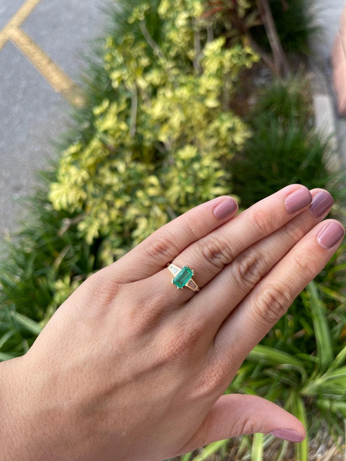 emerald cut with tapered baguettes