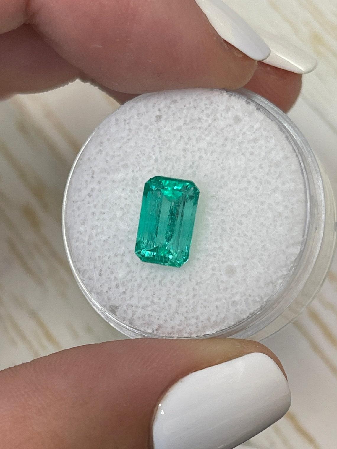 Modern 1.96 Carat 9x6 Bluish Green Loose Colombian Emerald - Emerald Cut Genuine May